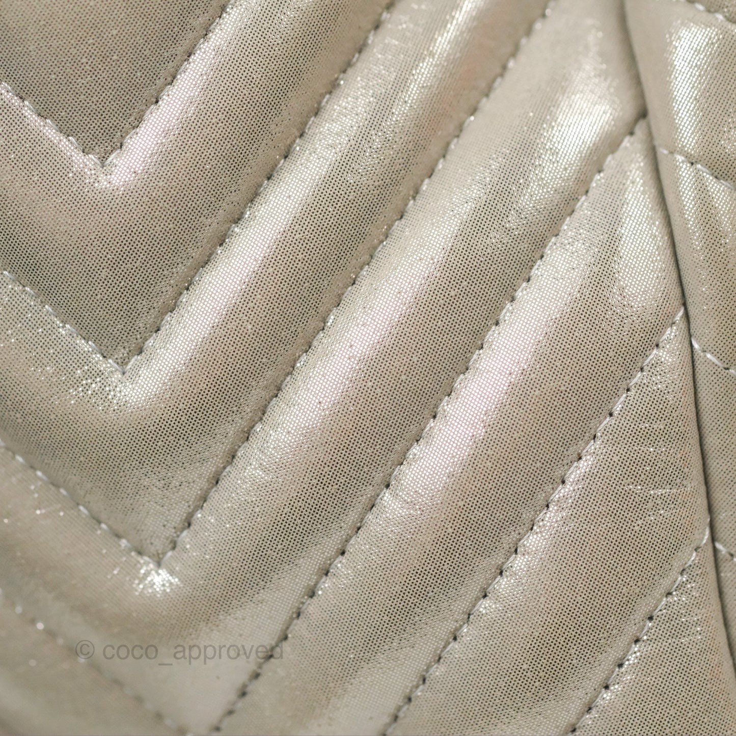 Chanel Small Urban Spirit Drawstring Bag Chevron Iridescent Silver Calfskin