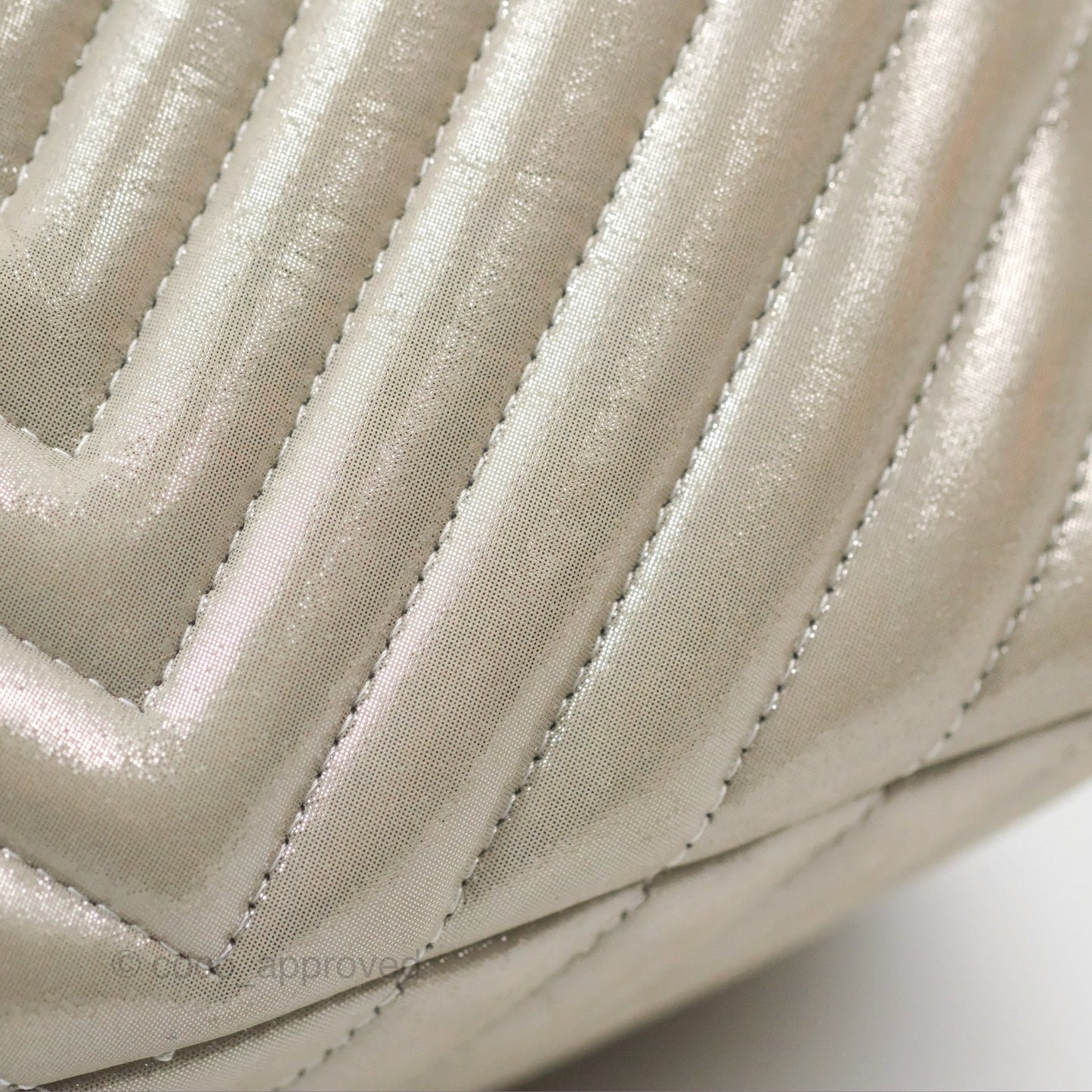 Chanel Small Urban Spirit Drawstring Bag Chevron Iridescent Silver Calfskin