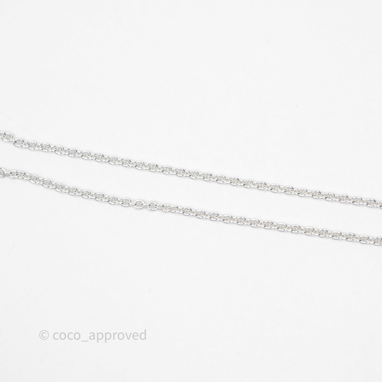 Hermès Amulettes Kelly Pendant in Sterling Silver
