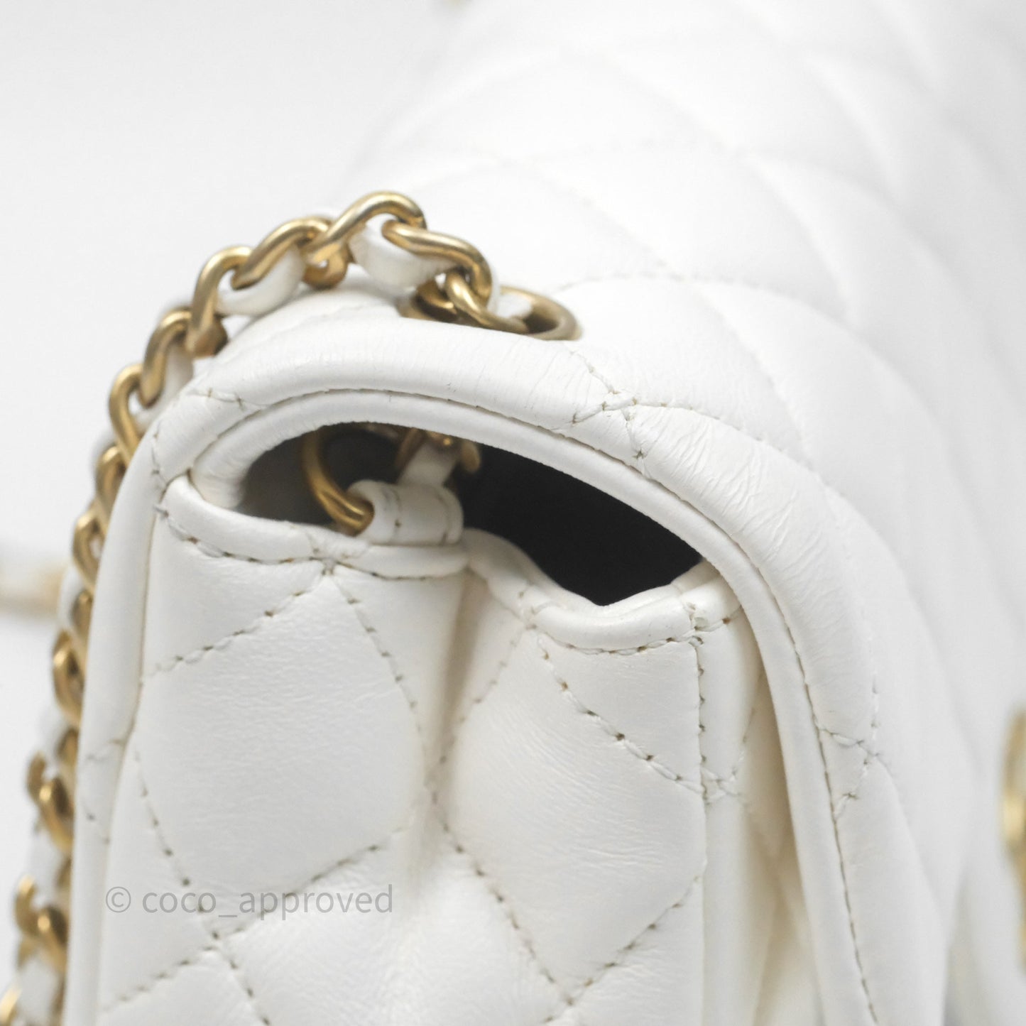 Chanel Mini Rectangular Pearl Crush Quilted White Lambskin Aged Gold Hardware