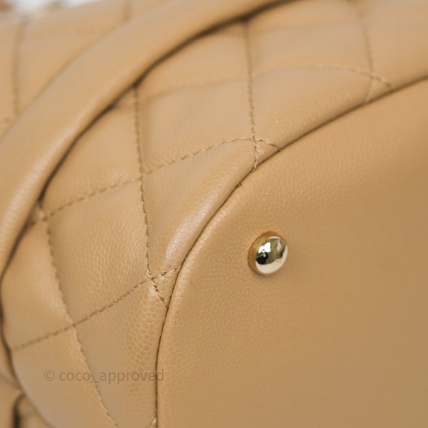 Chanel Rolled Up Bucket Drawstring Bag Beige Caviar Gold Hardware