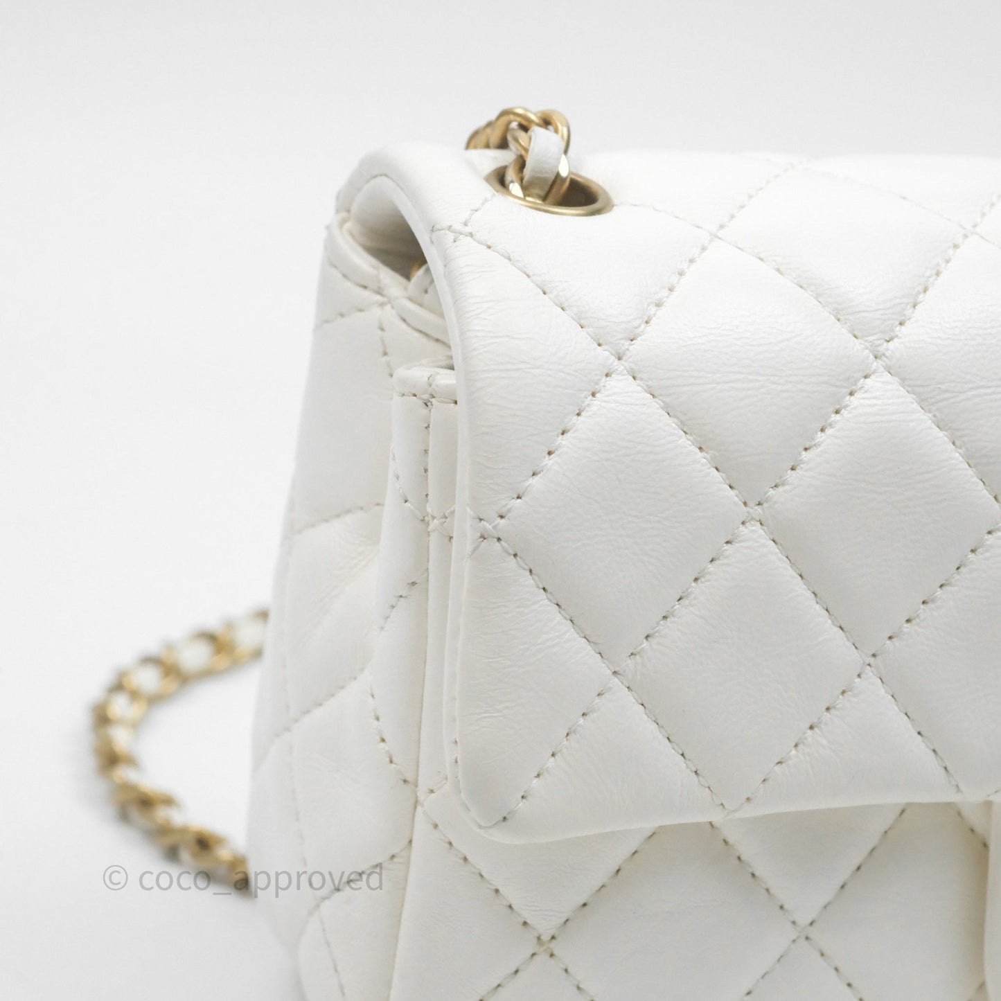 Chanel Mini Rectangular Pearl Crush Quilted White Lambskin Aged Gold Hardware