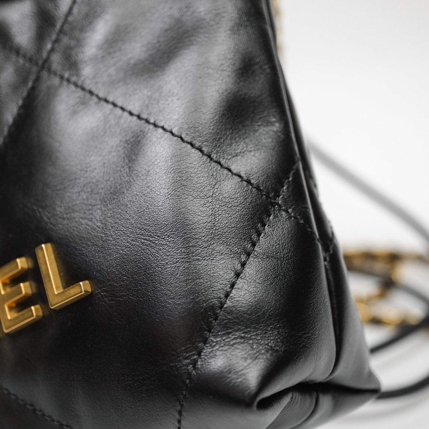 Chanel 22 Mini Bag Black Shiny Crumpled Calfskin Aged Gold Hardware
