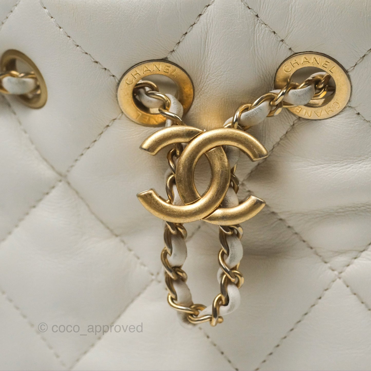 Chanel Quilted Drawstring Bucket Bag Ivory Lambskin Aged Gold Hardware