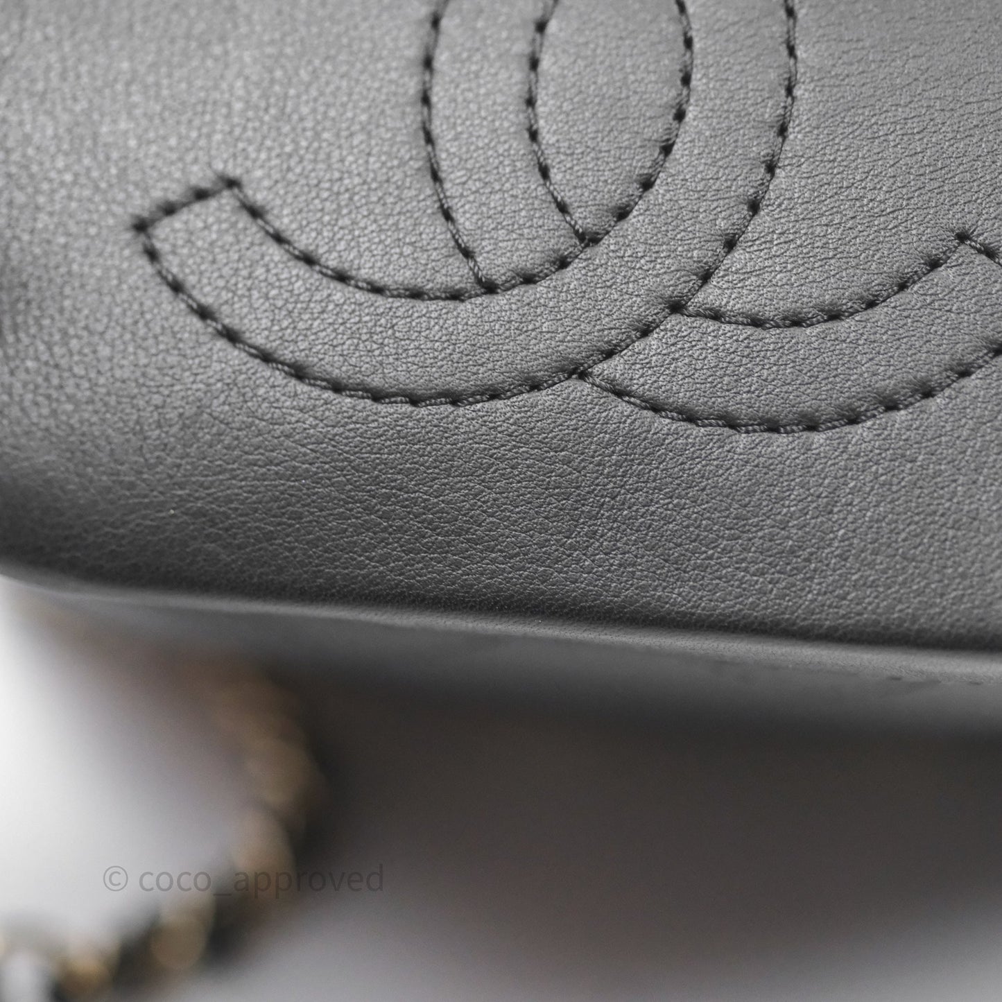 Chanel Quilted Drawstring Bucket Bag Black Calfskin Gold Hardware