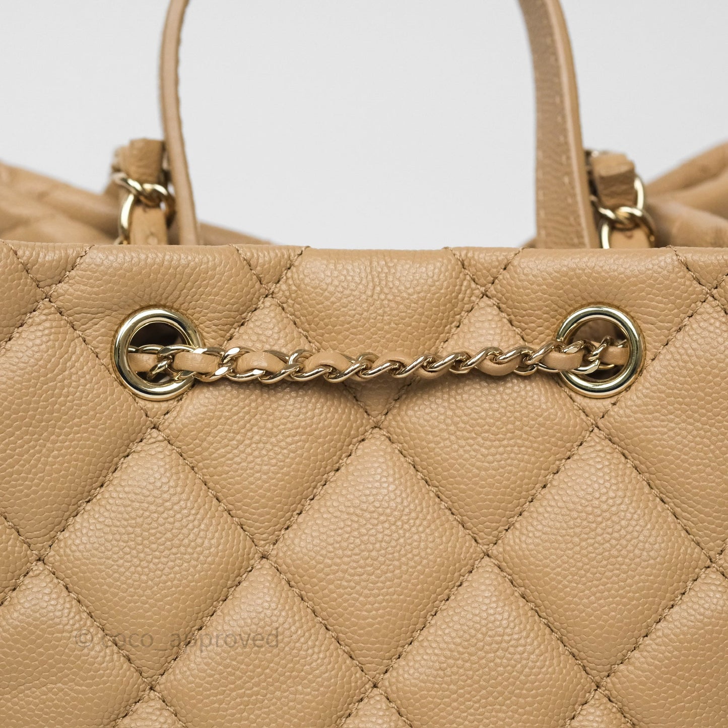 Chanel Rolled Up Bucket Drawstring Bag Beige Caviar Gold Hardware