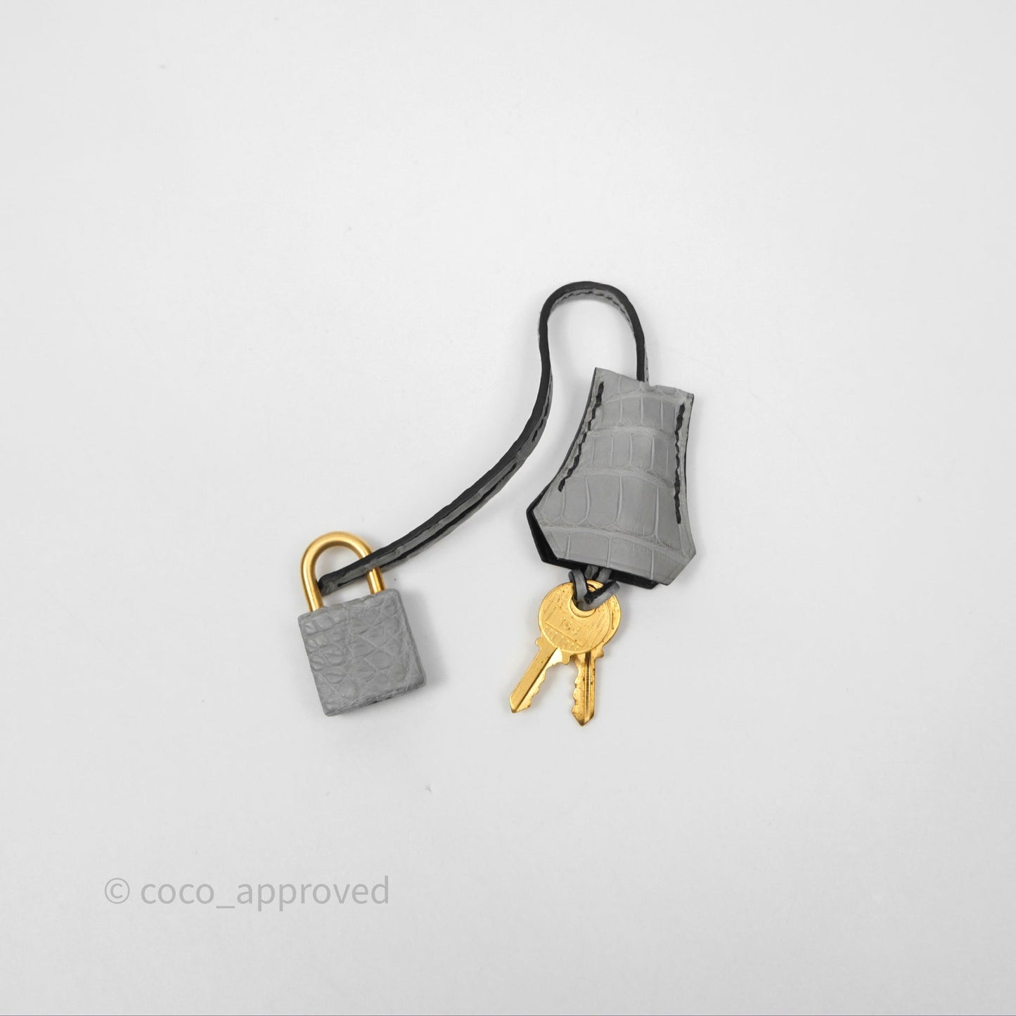 Hermès Retourne Kelly 25 Alligator Perso Noir 89 / Gris Mouette 4Z Brushed Gold Hardware