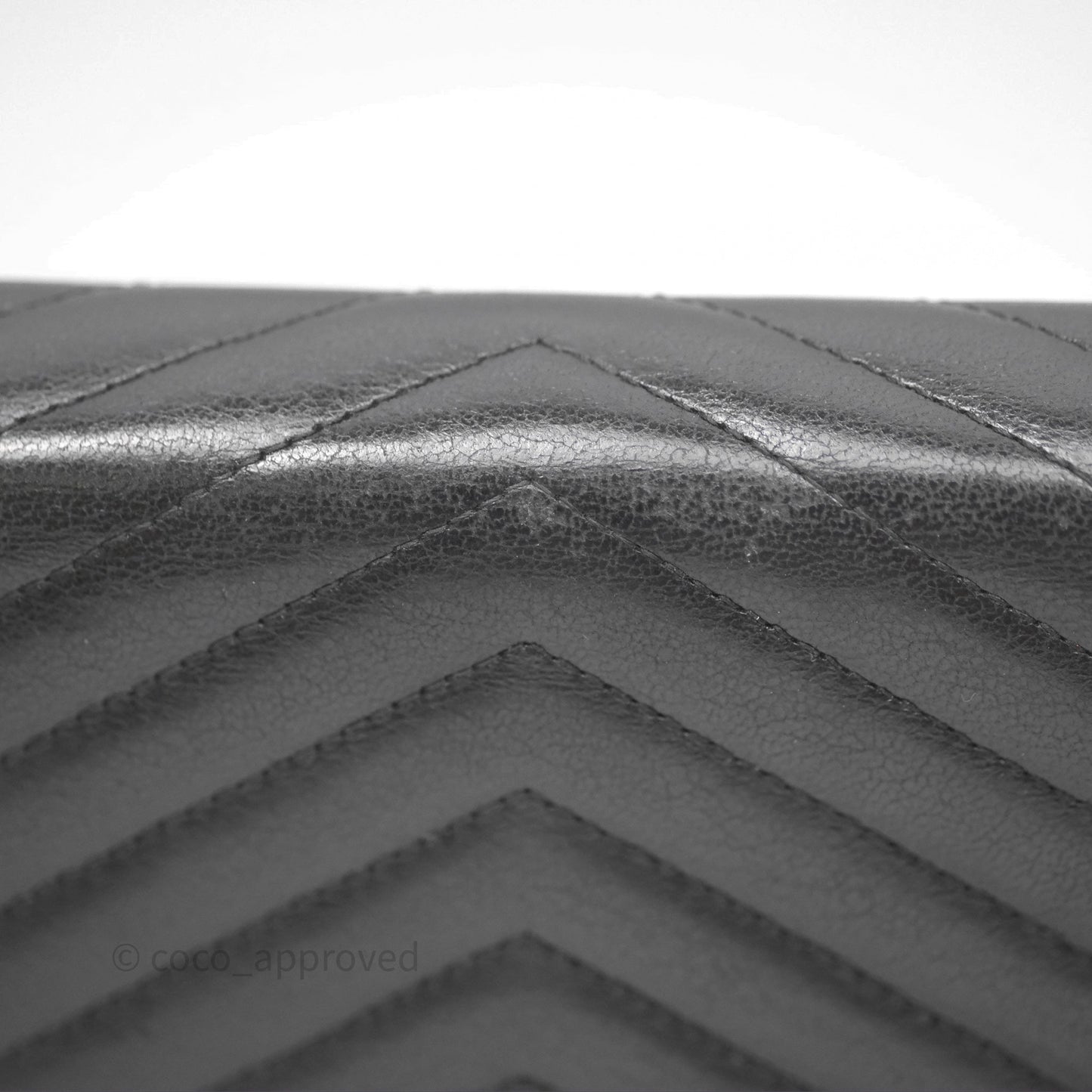 Chanel Reversed Chevron Wallet On Chain WOC Black Lambskin Aged Gold Hardware