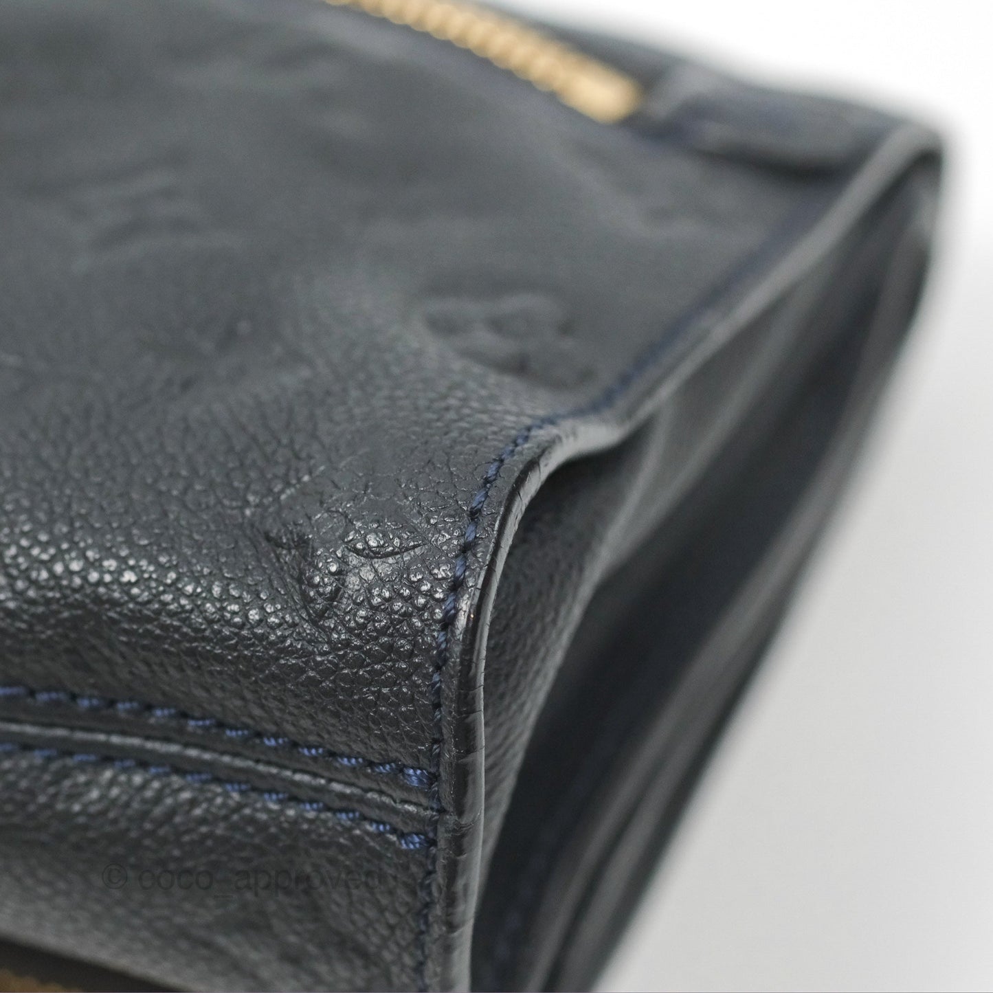 Louis Vuitton Petillante Clutch Empreinte Infini Navy