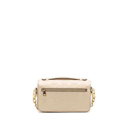 Louis Vuitton Pochette Métis East West Monogram Empreinte Leather Cream GHW