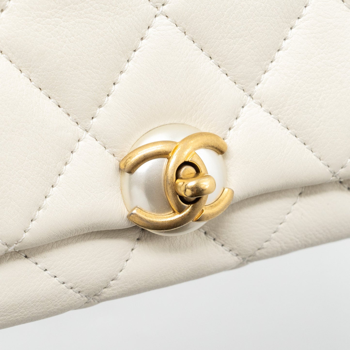Chanel quilted mini flap bag Calfskin white GHW
