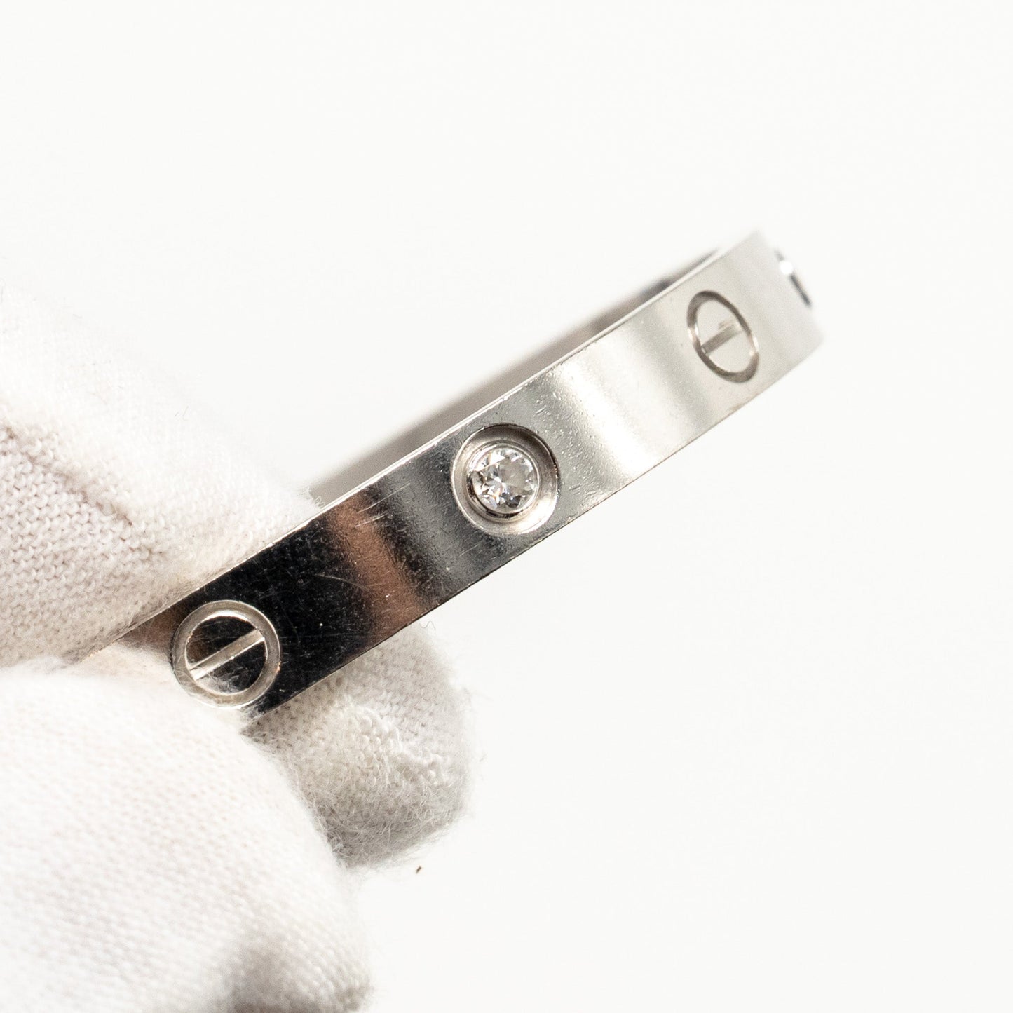 Cartier size 16 love bracelet white gold with 4 diamonds