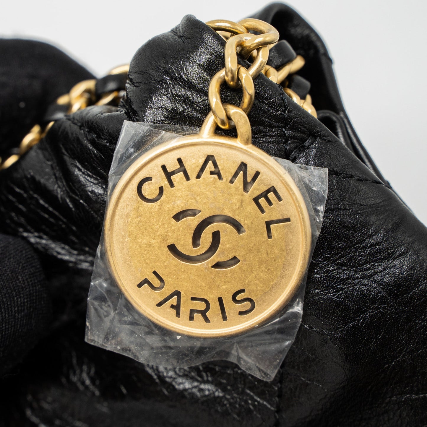 Chanel 23S Mini 22 Bag with Pearl Shiny Calfskin Black Brushed GHW (Microchip)