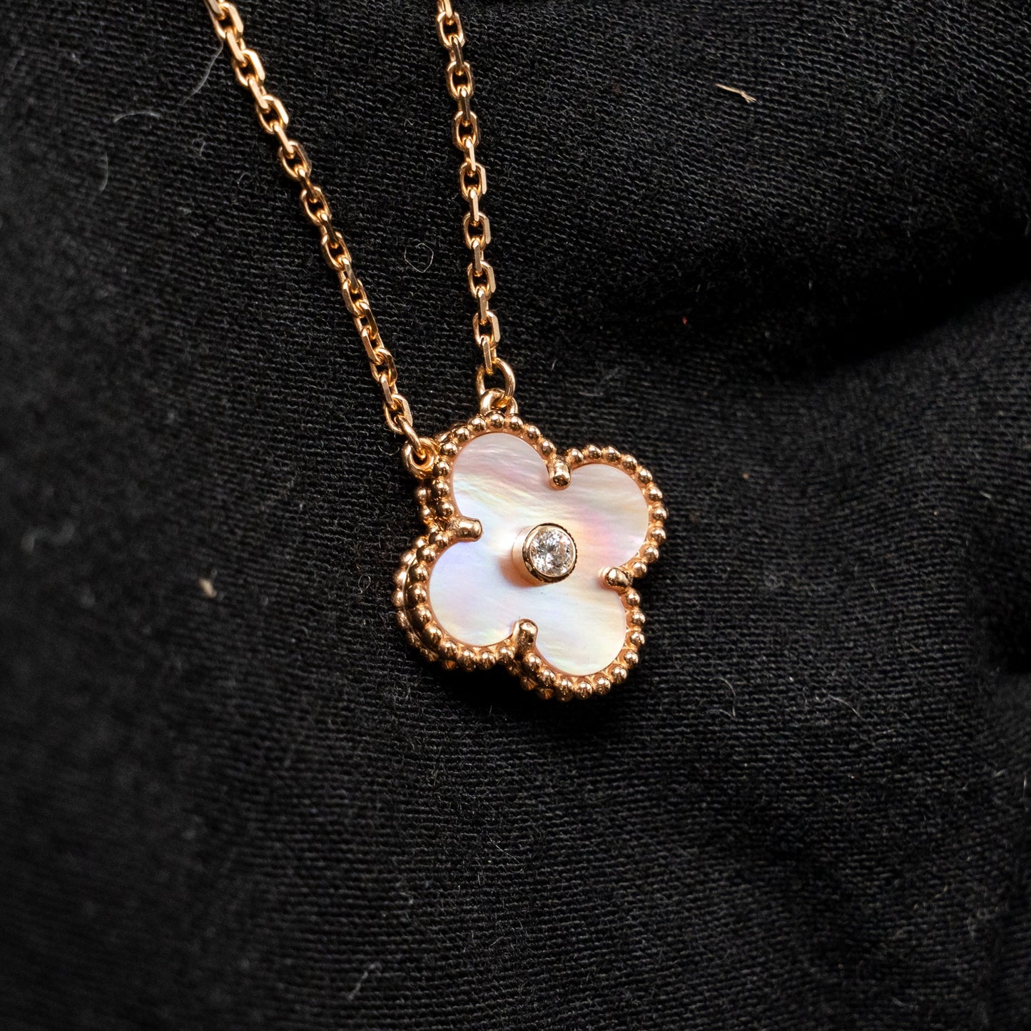 Van Cleef & arpels 2025 holiday pendant pink mother of pearl rose gold with diamond