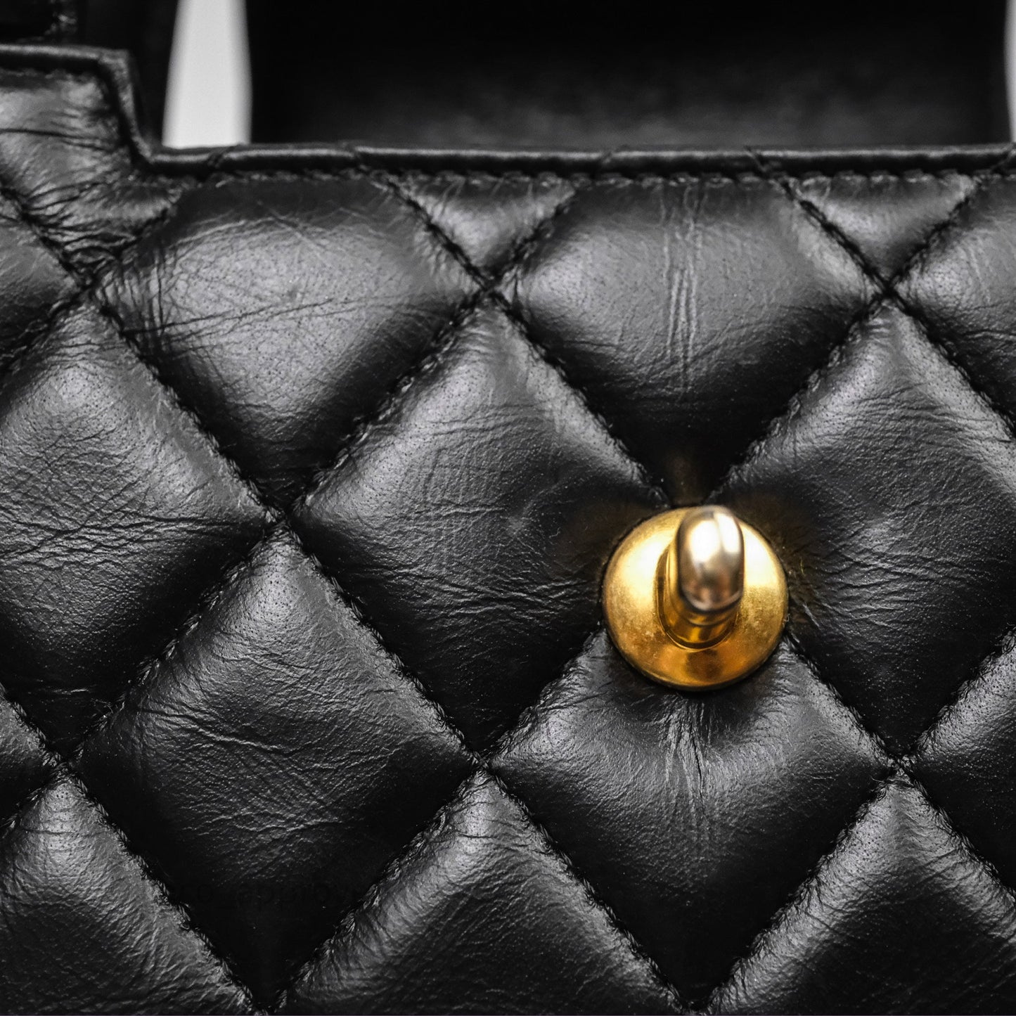 Chanel Kelly Bag Quilted Black Shiny Crumpled Calfskin Aged Gold Hardware