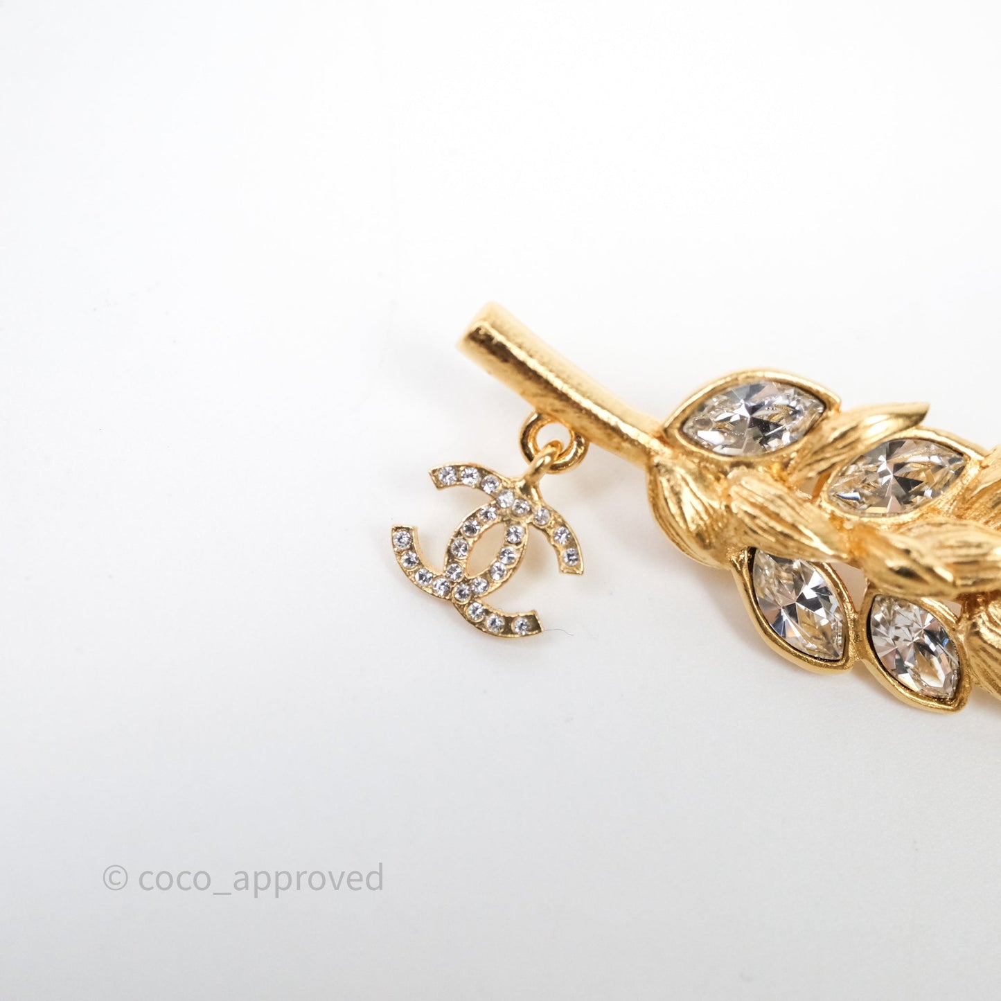 Chanel CC Wheat Crystal Brooch Gold Tone 23V