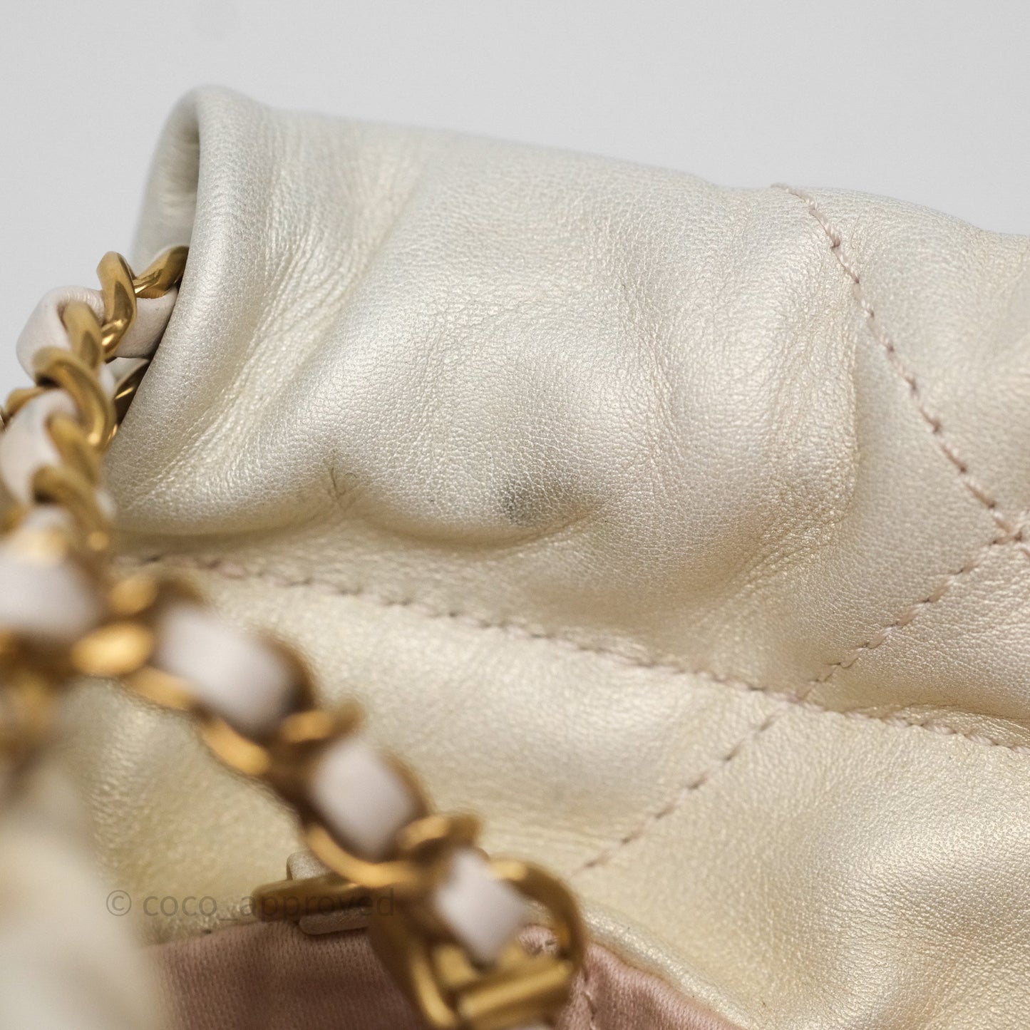 Chanel 22 Mini Bag Iridescent Light Pearly Calfskin Aged Gold Hardware