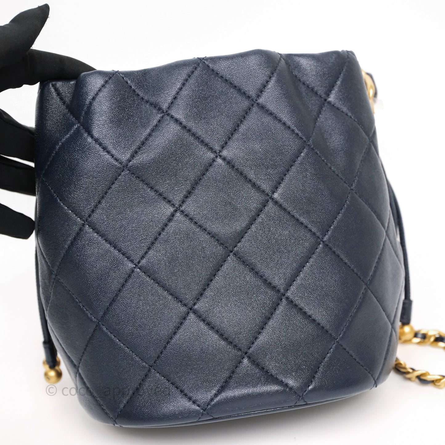 Chanel Small Entwined Chain Drawstring Bucket Bag Navy Lambskin Age Gold Hardware