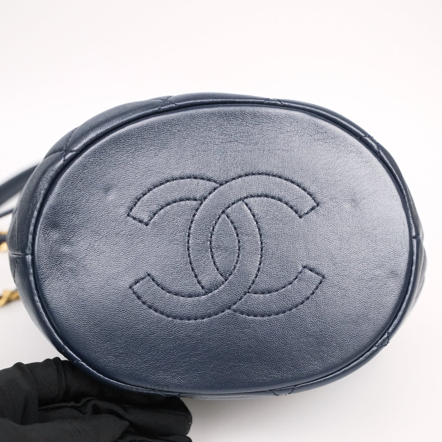 Chanel Small Entwined Chain Drawstring Bucket Bag Navy Lambskin Age Gold Hardware