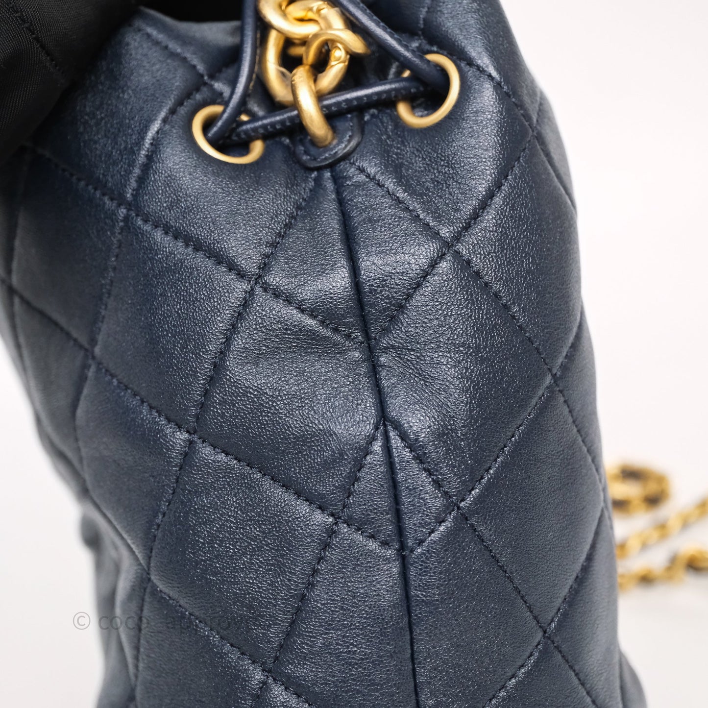 Chanel Small Entwined Chain Drawstring Bucket Bag Navy Lambskin Age Gold Hardware