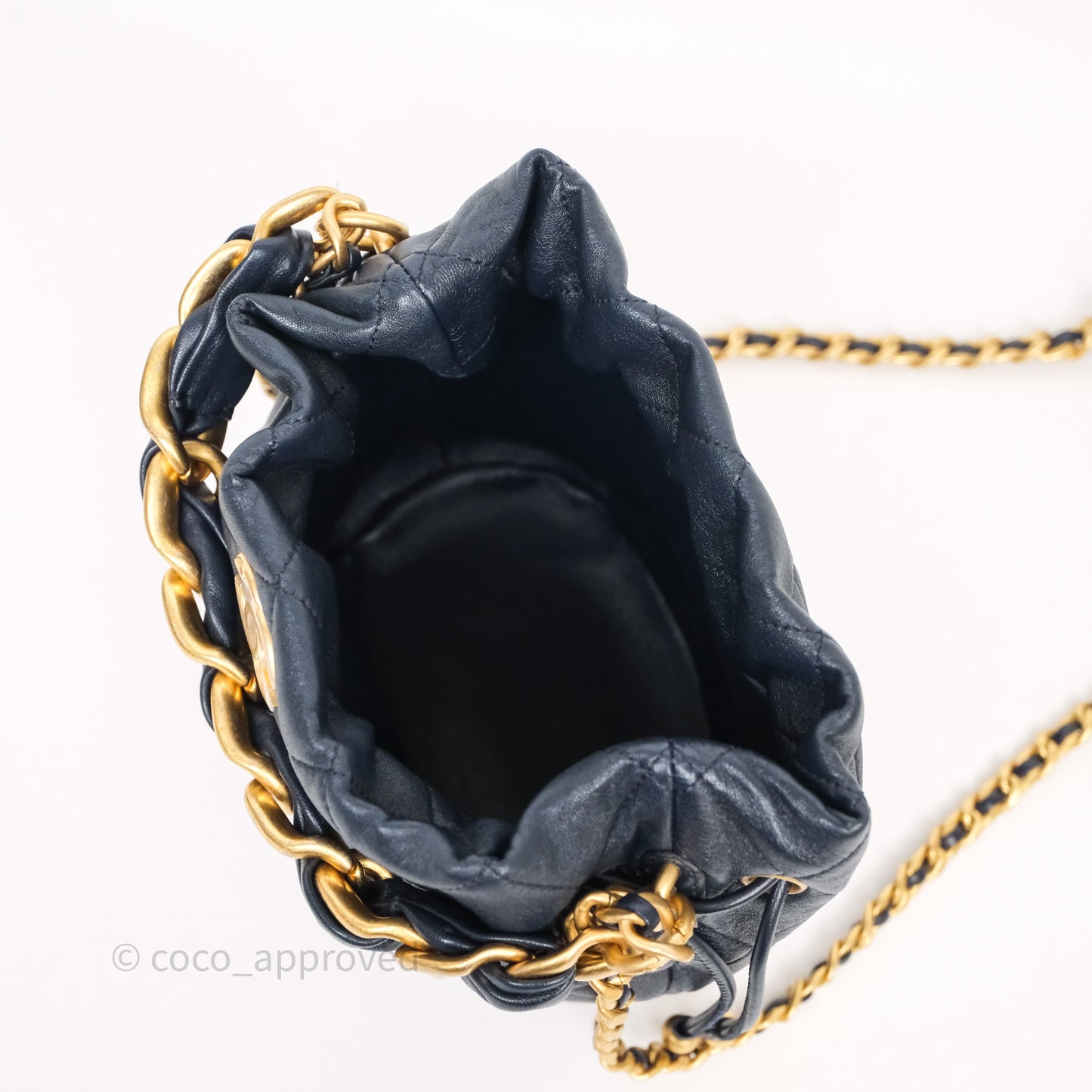 Chanel Small Entwined Chain Drawstring Bucket Bag Navy Lambskin Age Gold Hardware