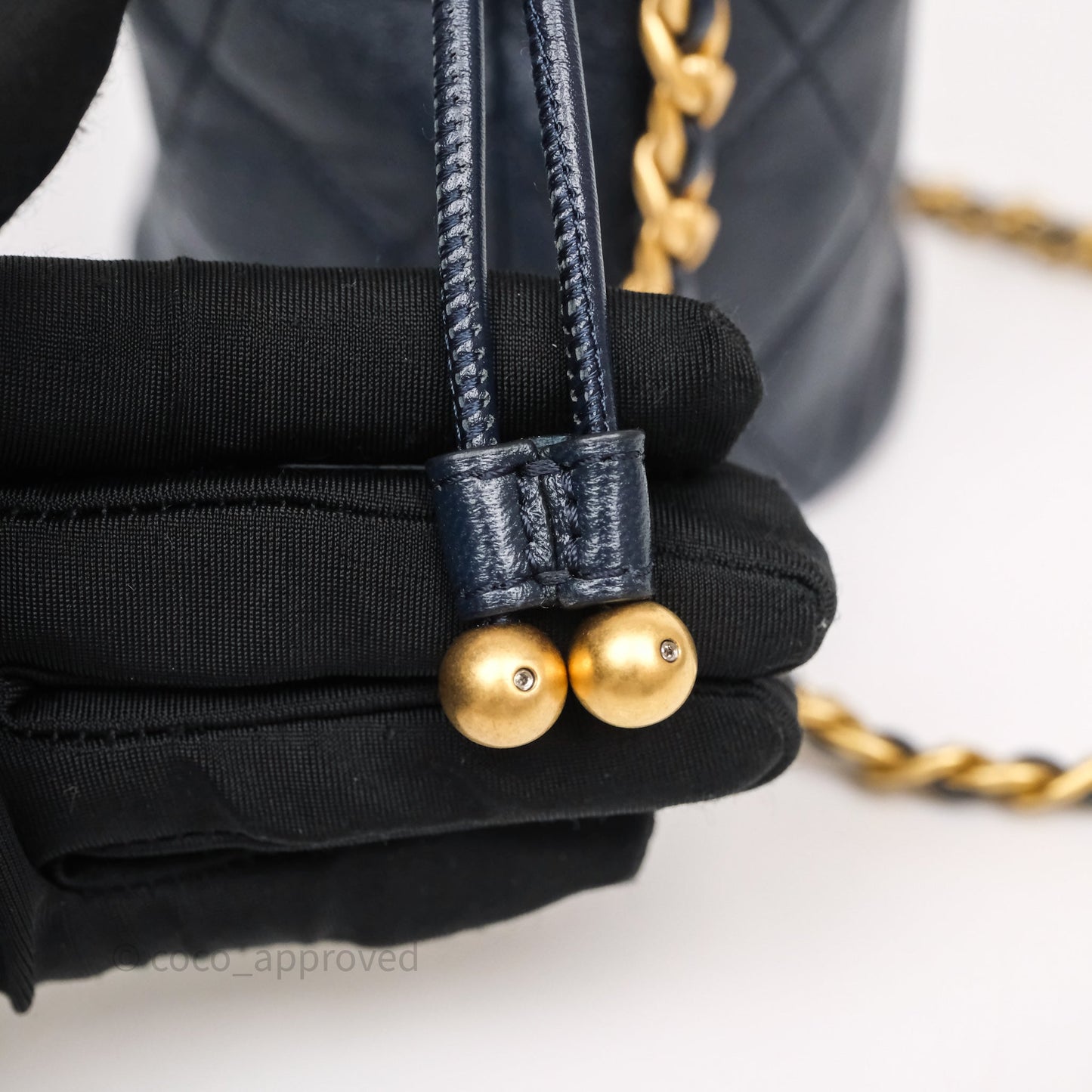 Chanel Small Entwined Chain Drawstring Bucket Bag Navy Lambskin Age Gold Hardware