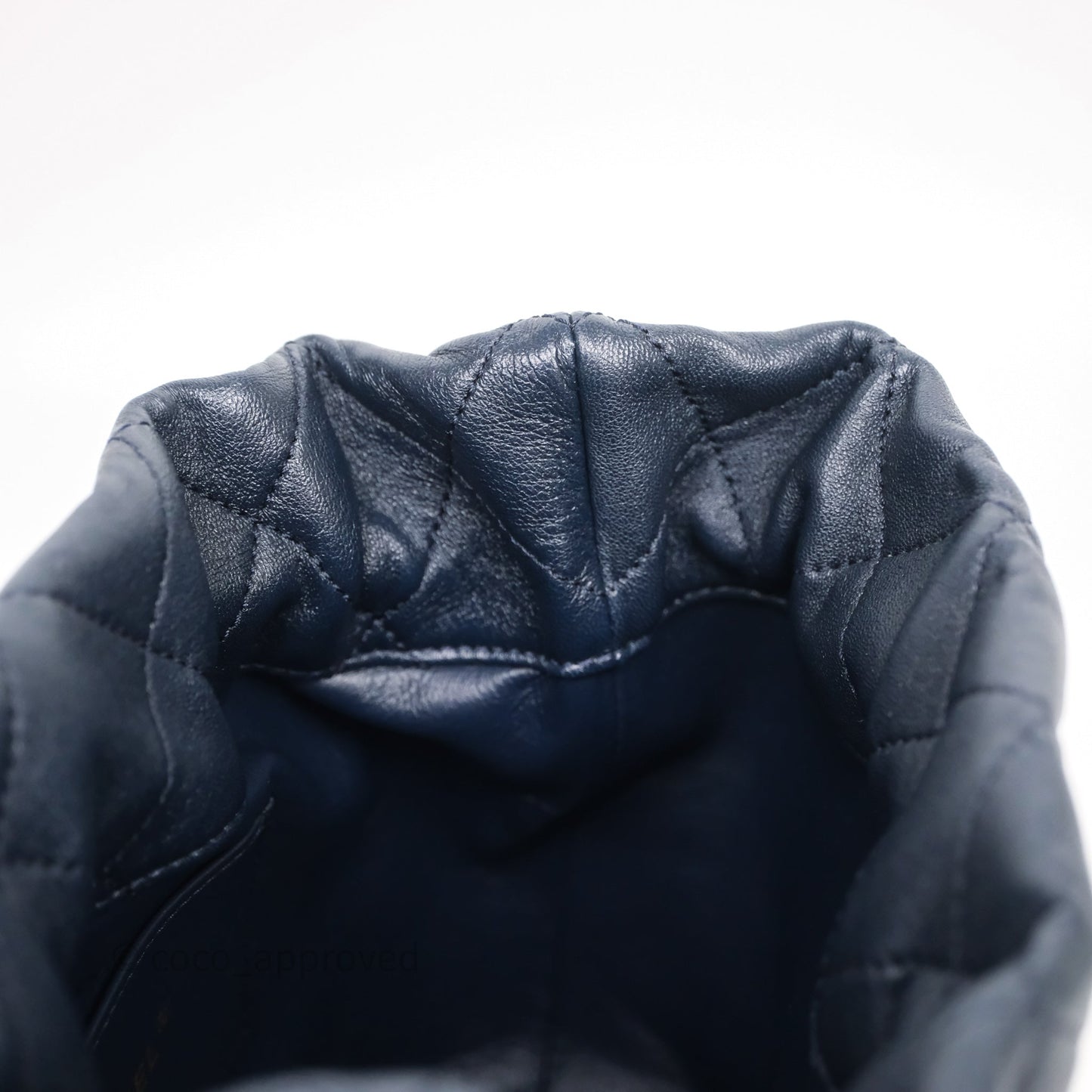 Chanel Small Entwined Chain Drawstring Bucket Bag Navy Lambskin Age Gold Hardware