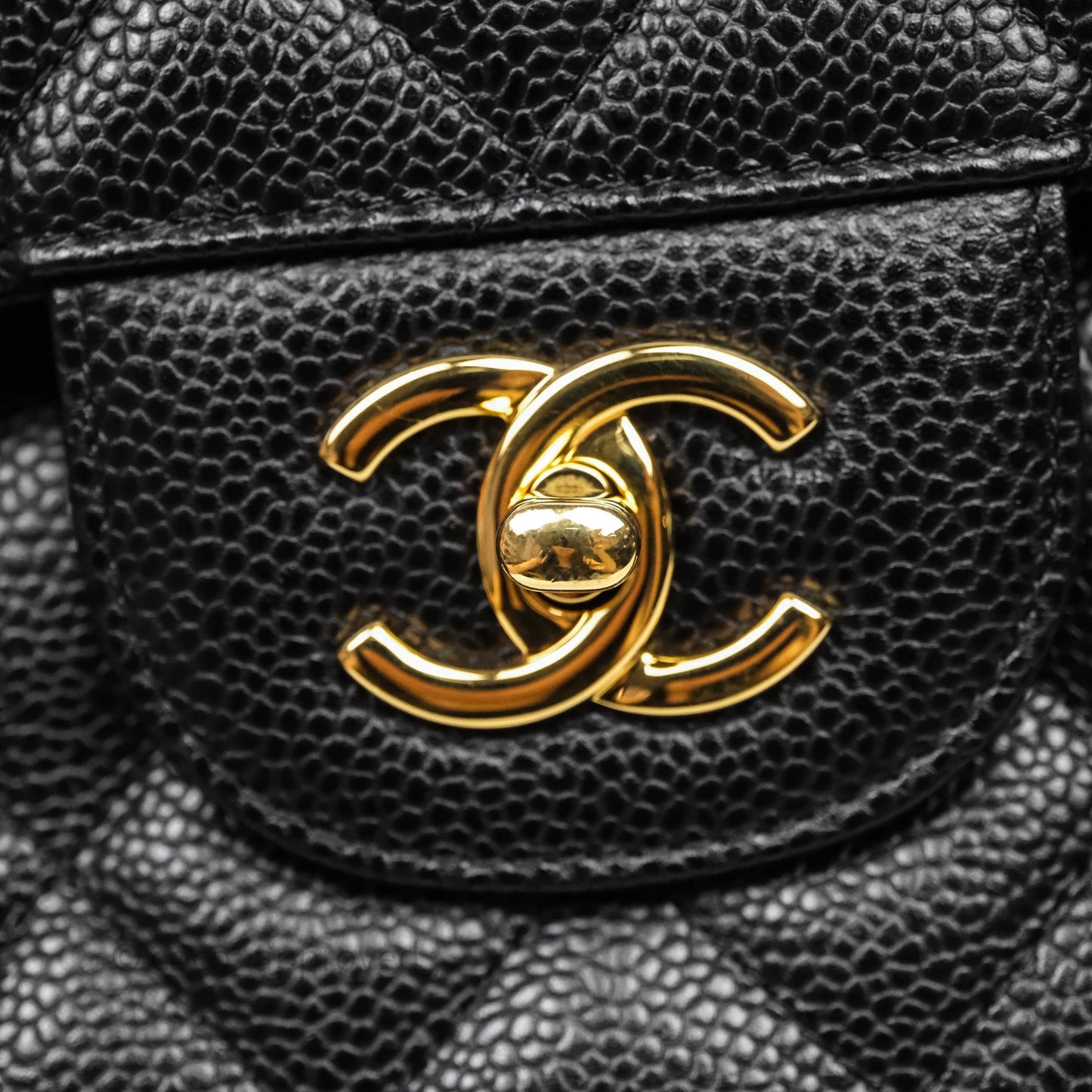 Chanel Quilted Jumbo Double Flap Black Caviar Gold Hardware
