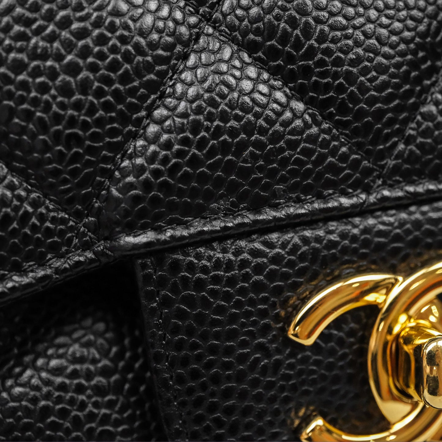 Chanel Quilted Jumbo Double Flap Black Caviar Gold Hardware