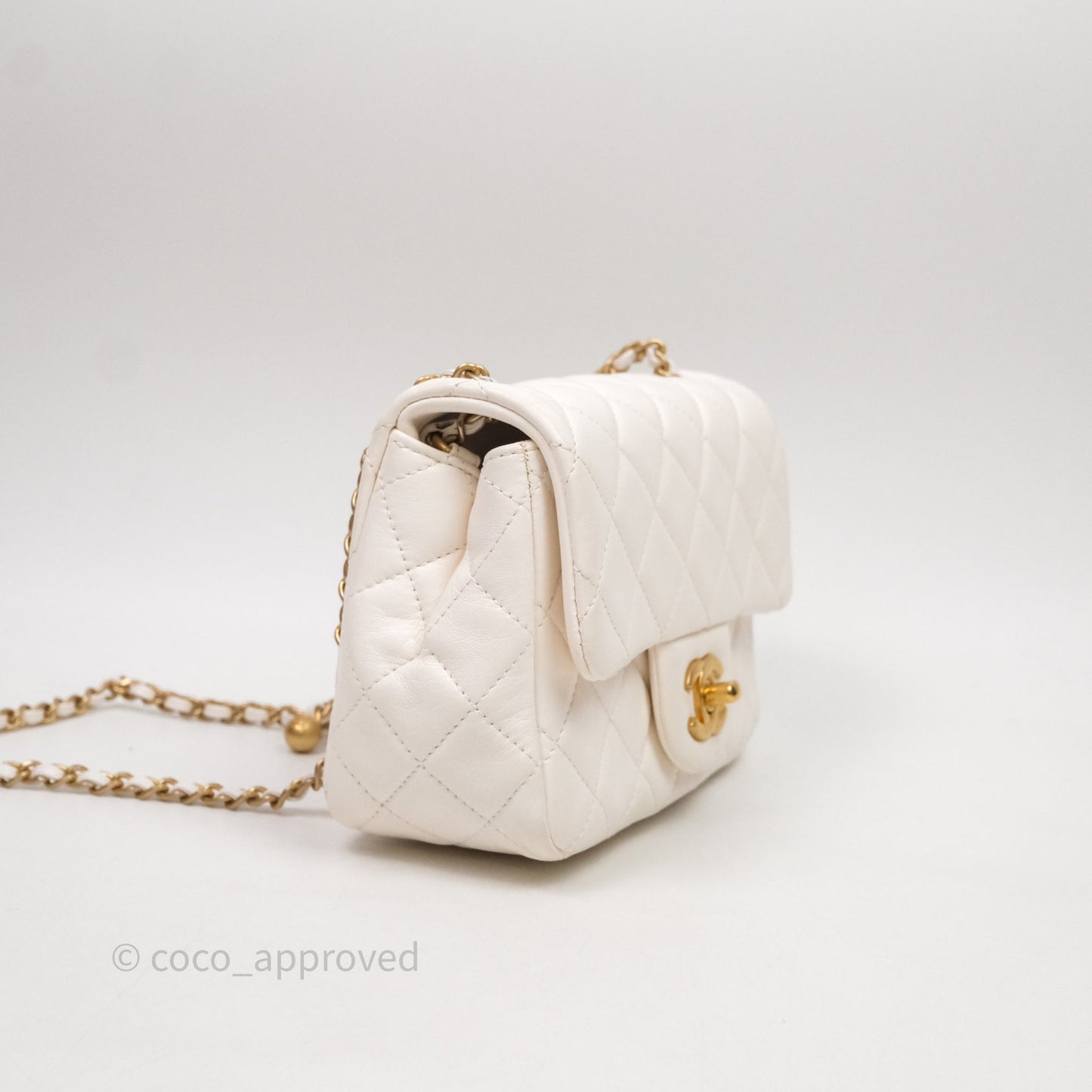 Chanel Mini Square Pearl Crush Quilted White Lambskin Aged Gold Hardware