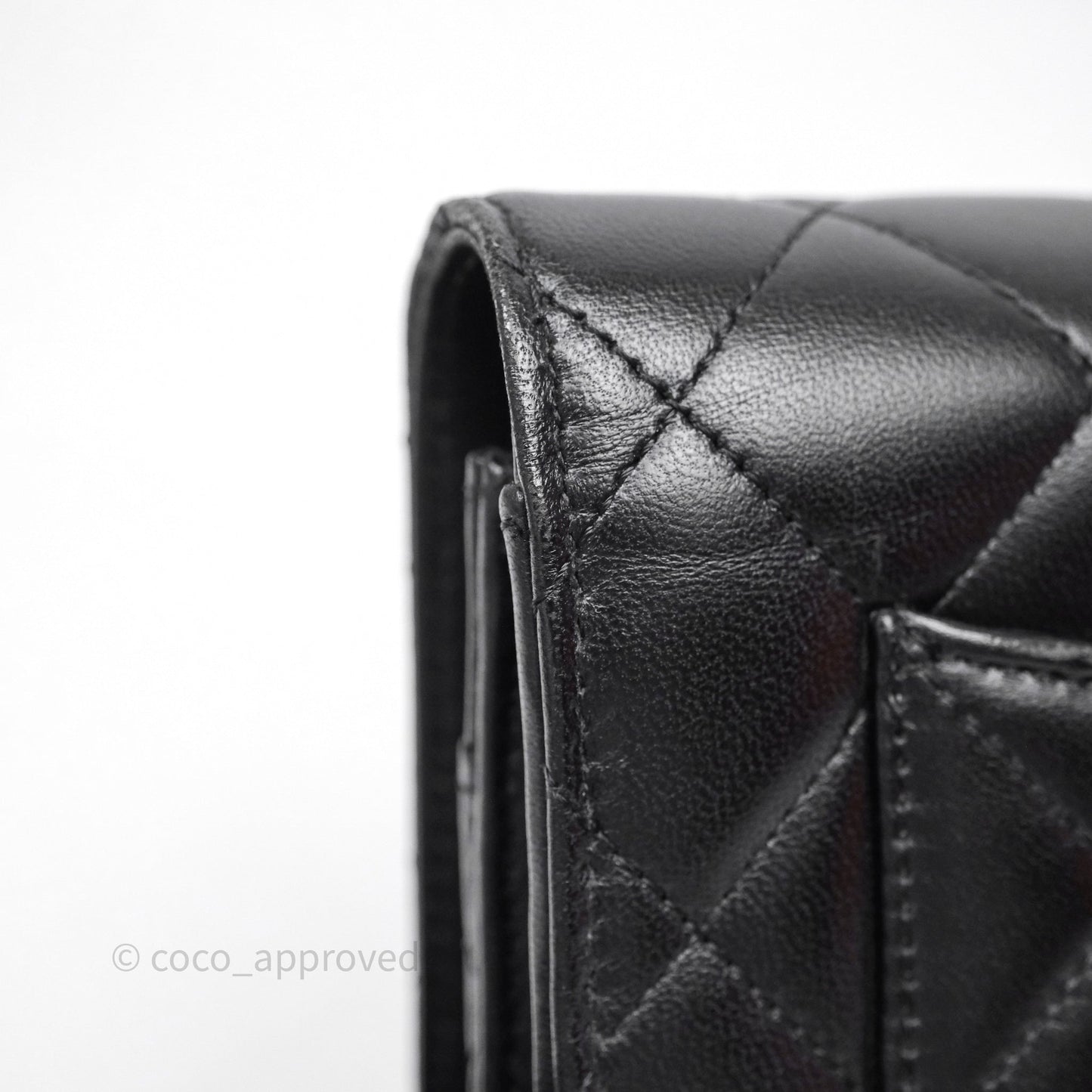 Chanel Quilted WOC Black Lambskin Silver Hardware