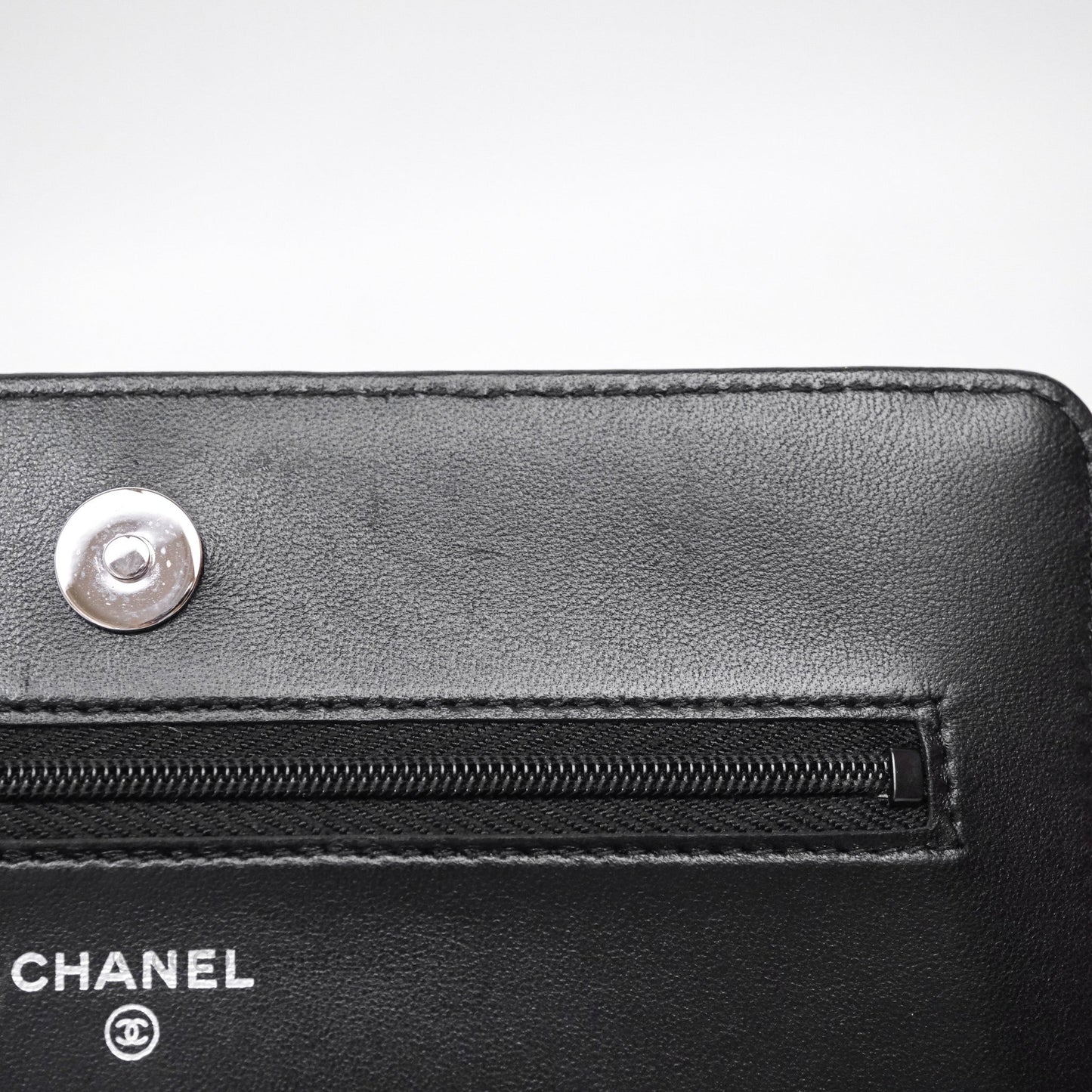 Chanel Quilted WOC Black Lambskin Silver Hardware