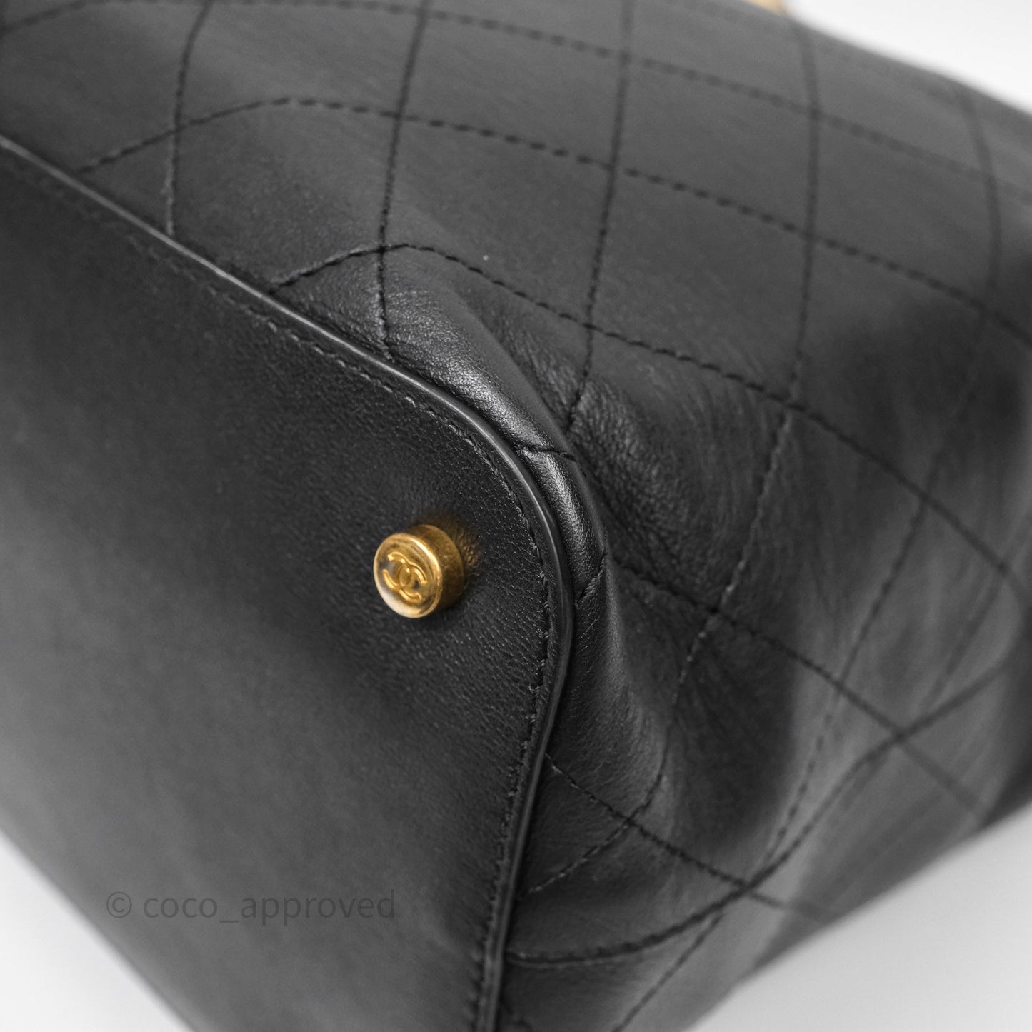 Chanel Quilted Drawstring Bucket Bag Black Calfskin Aged Gold Hardware