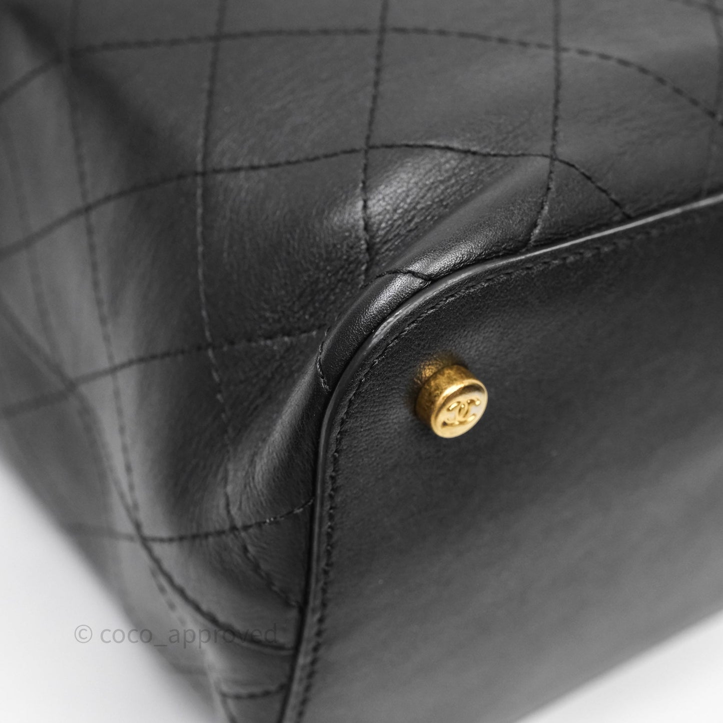 Chanel Quilted Drawstring Bucket Bag Black Calfskin Aged Gold Hardware
