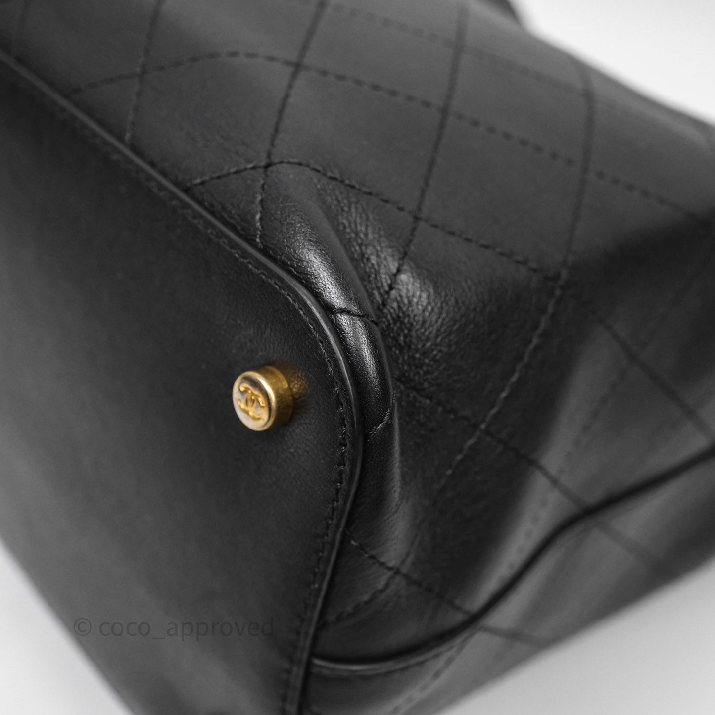 Chanel Quilted Drawstring Bucket Bag Black Calfskin Aged Gold Hardware