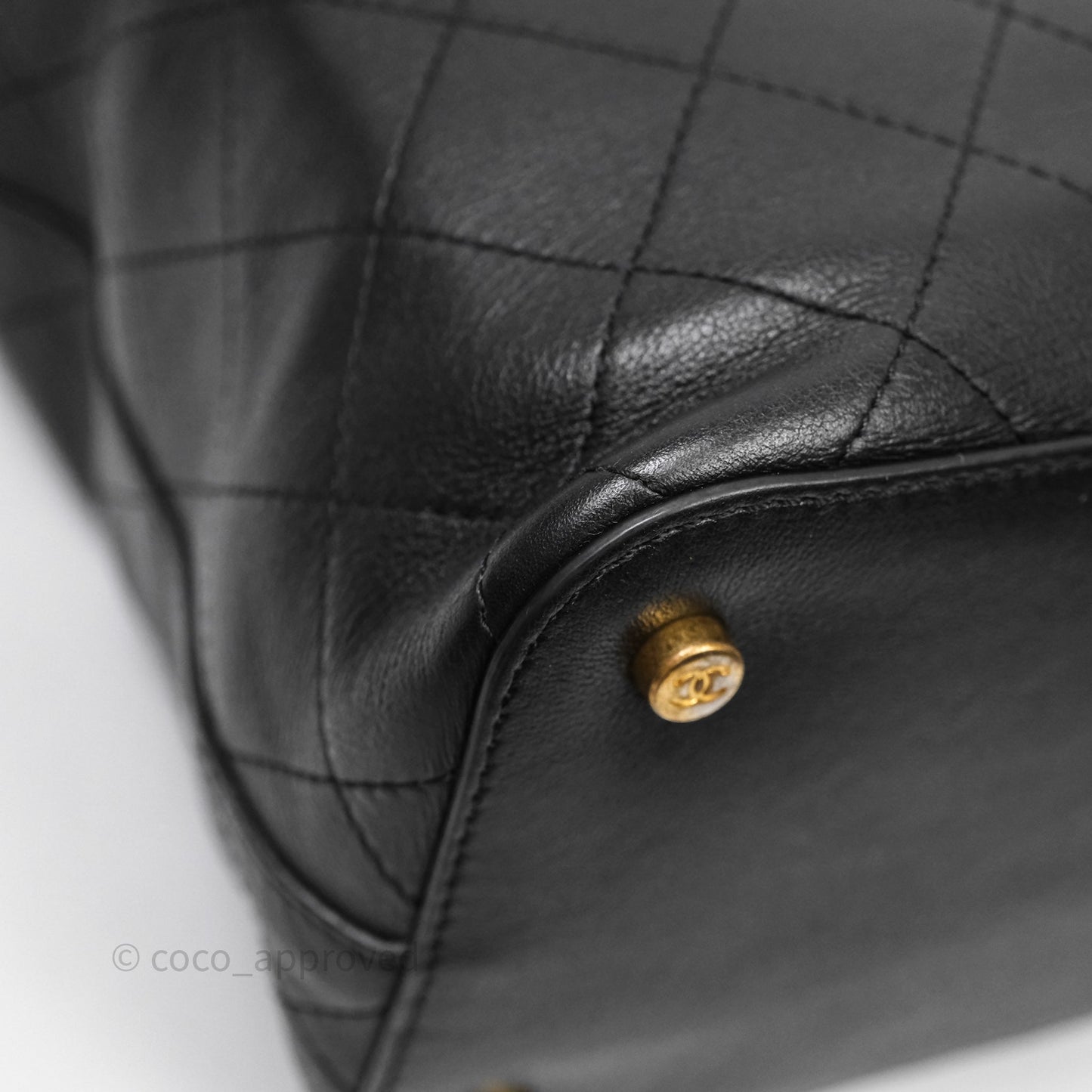 Chanel Quilted Drawstring Bucket Bag Black Calfskin Aged Gold Hardware