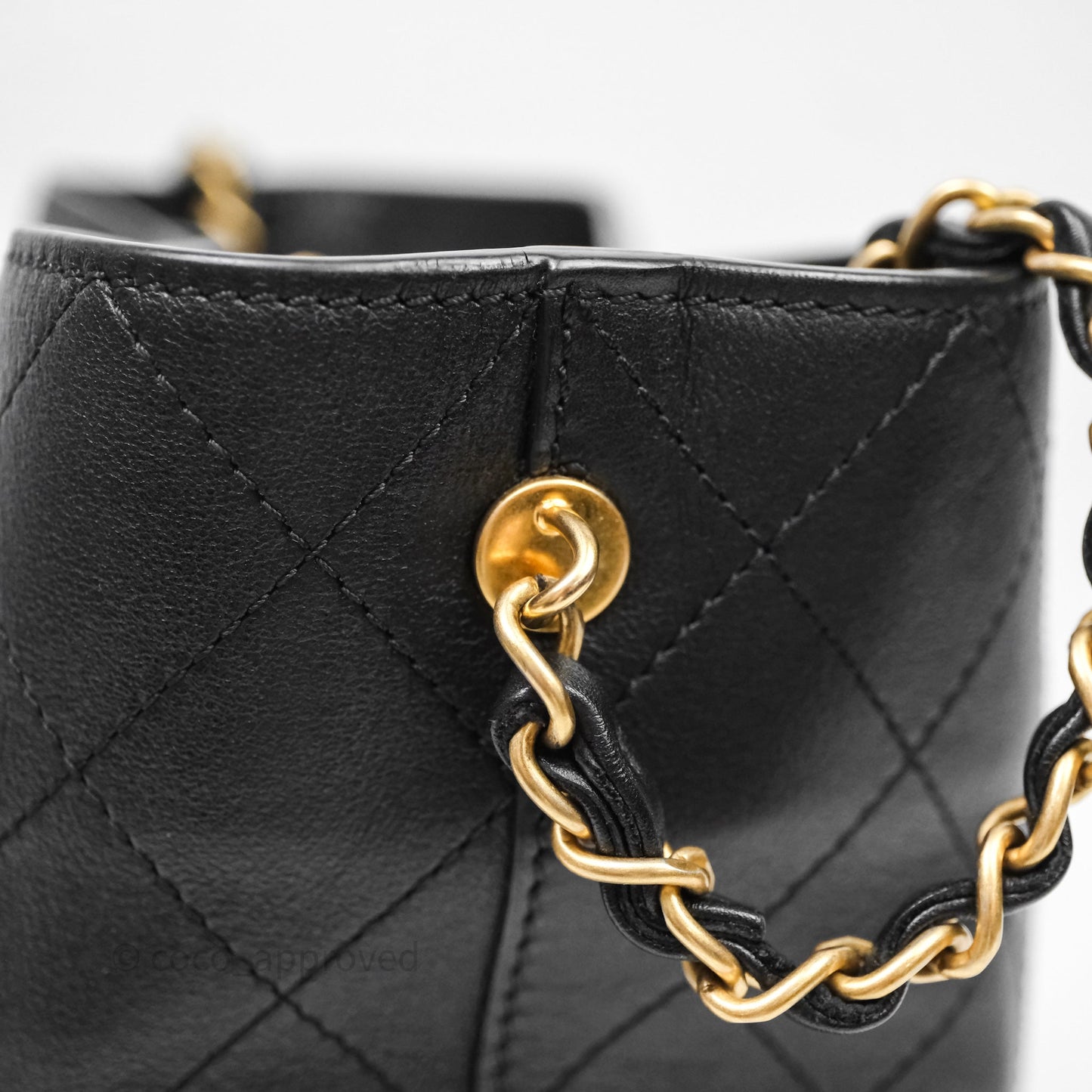 Chanel Quilted Drawstring Bucket Bag Black Calfskin Aged Gold Hardware