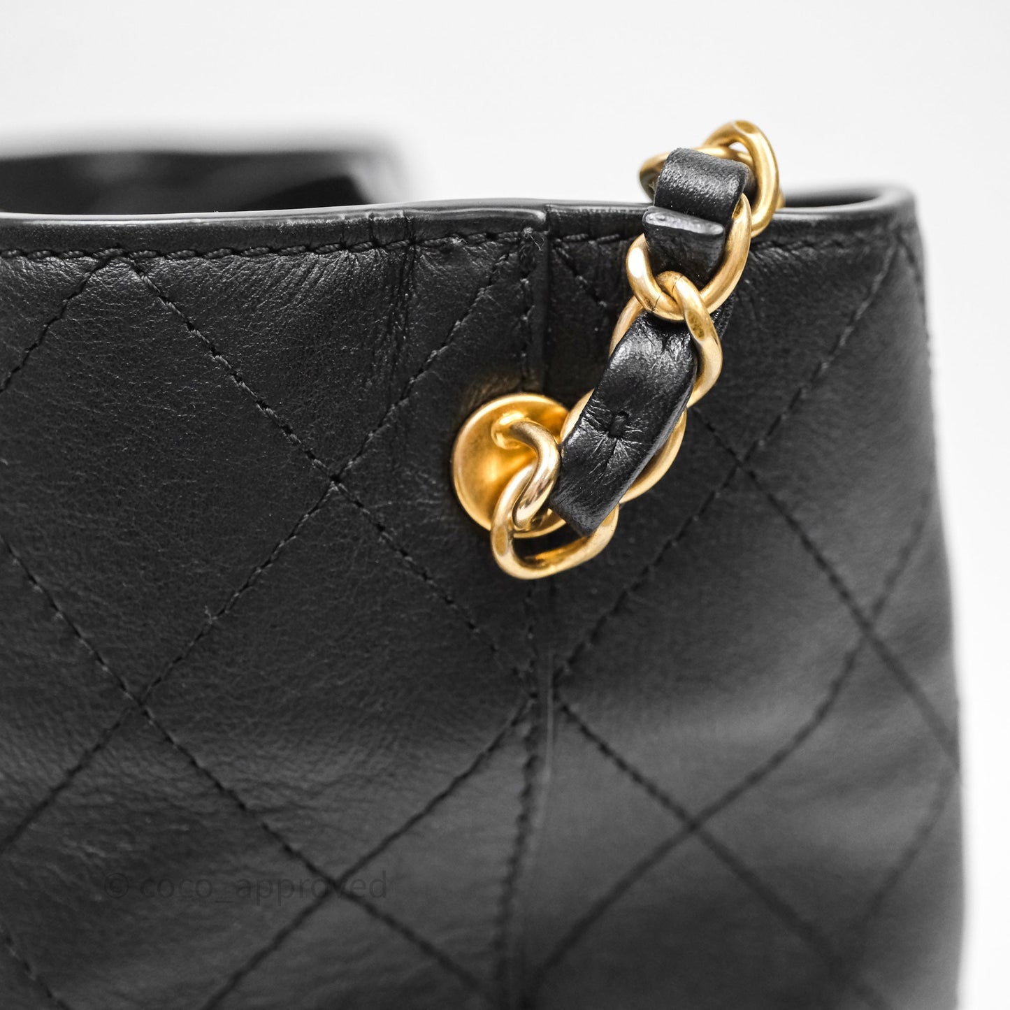 Chanel Quilted Drawstring Bucket Bag Black Calfskin Aged Gold Hardware