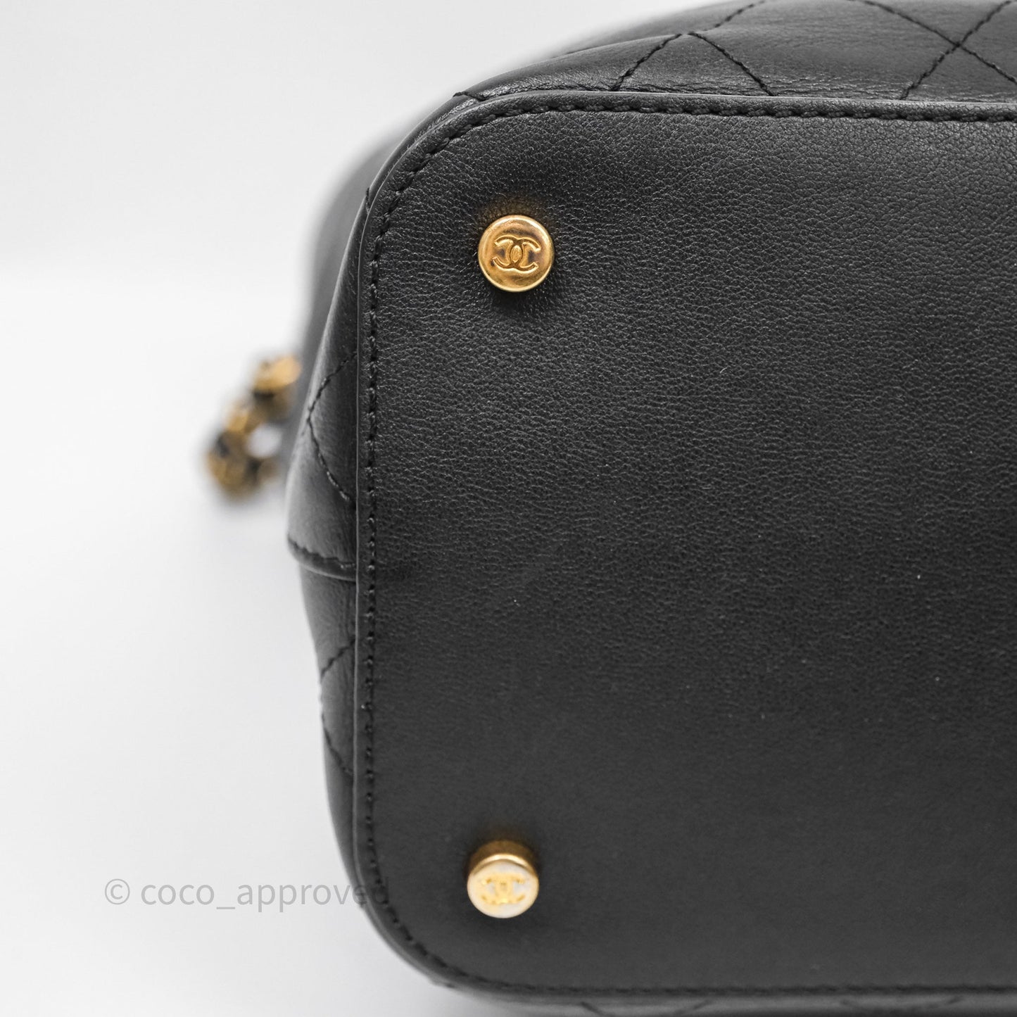 Chanel Quilted Drawstring Bucket Bag Black Calfskin Aged Gold Hardware