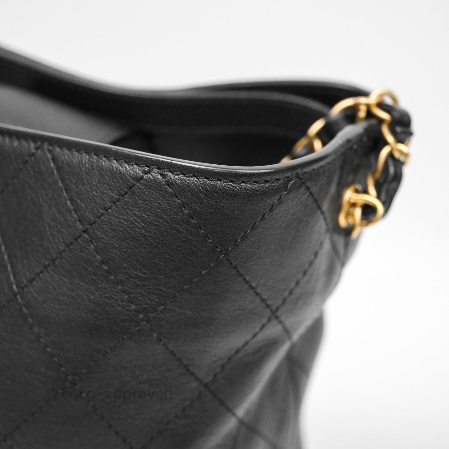 Chanel Quilted Drawstring Bucket Bag Black Calfskin Aged Gold Hardware