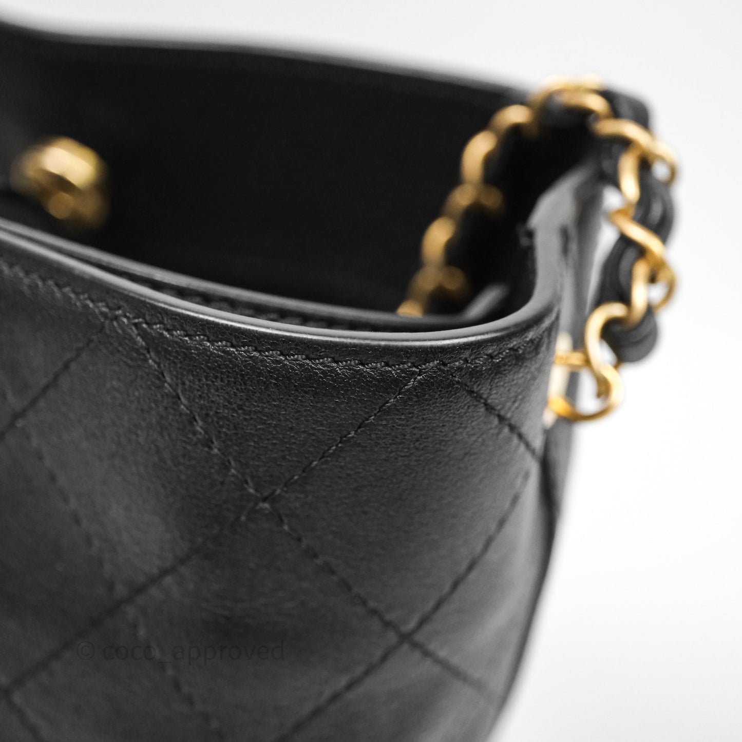 Chanel Quilted Drawstring Bucket Bag Black Calfskin Aged Gold Hardware