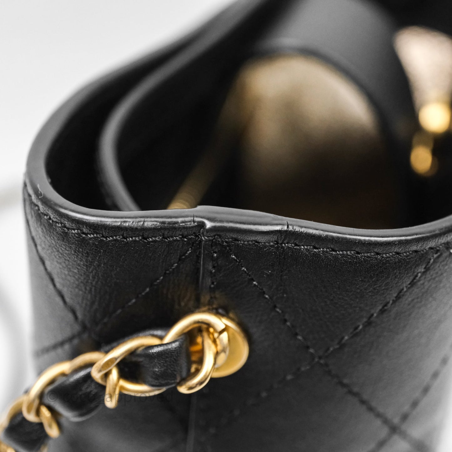 Chanel Quilted Drawstring Bucket Bag Black Calfskin Aged Gold Hardware
