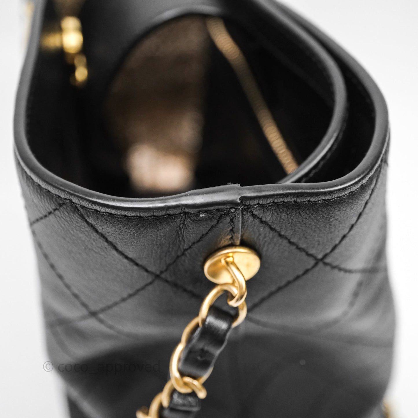 Chanel Quilted Drawstring Bucket Bag Black Calfskin Aged Gold Hardware