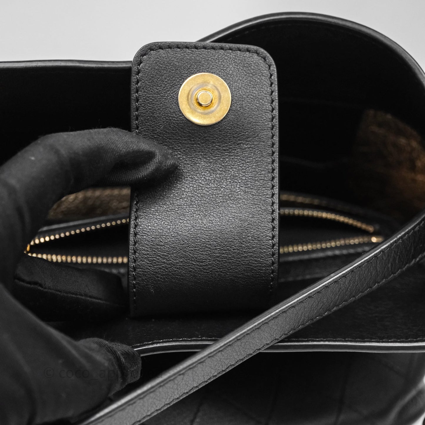 Chanel Quilted Drawstring Bucket Bag Black Calfskin Aged Gold Hardware