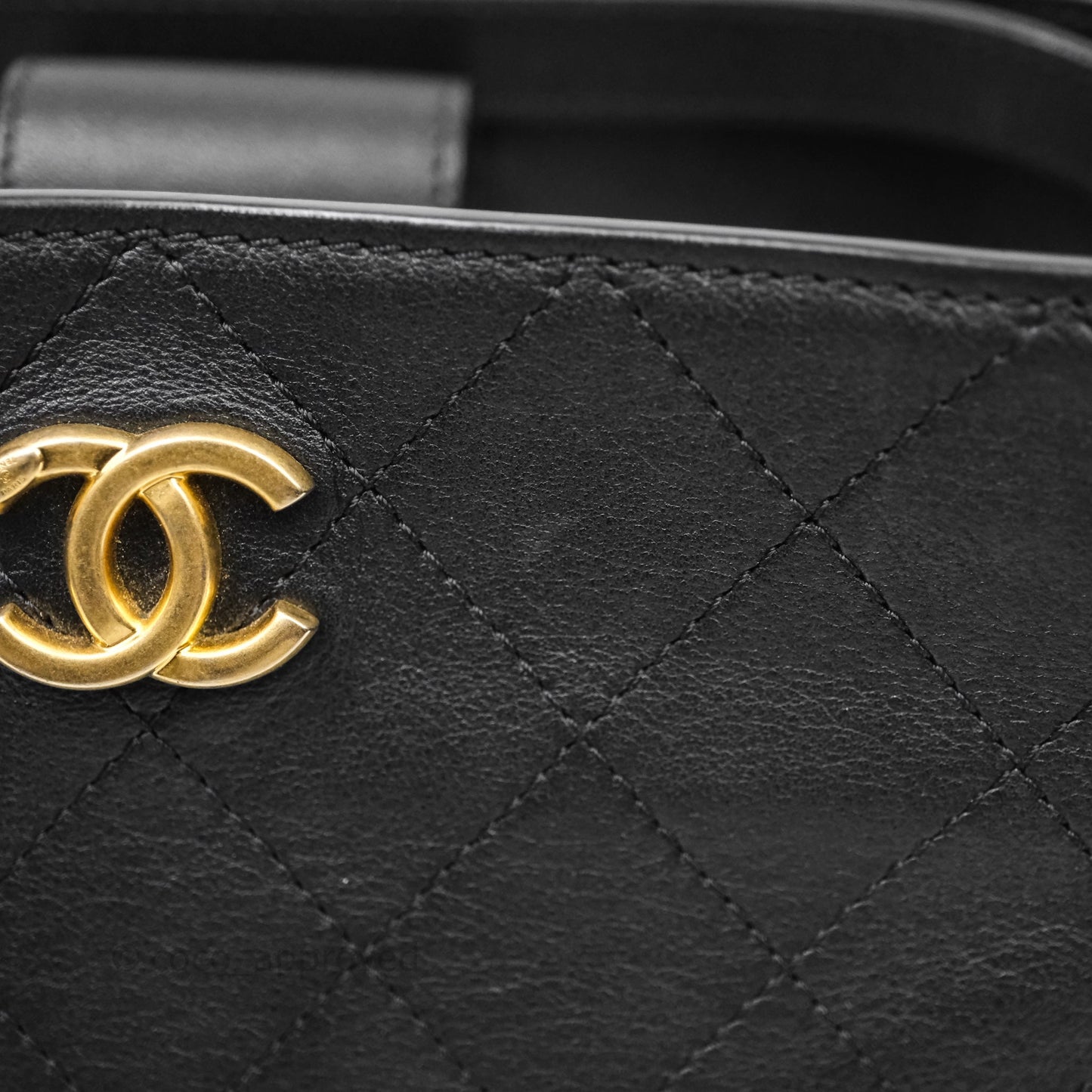 Chanel Quilted Drawstring Bucket Bag Black Calfskin Aged Gold Hardware