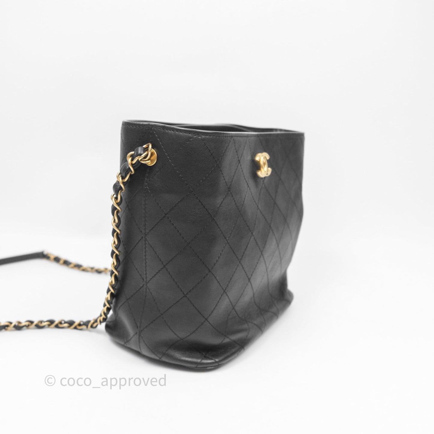 Chanel Quilted Drawstring Bucket Bag Black Calfskin Aged Gold Hardware