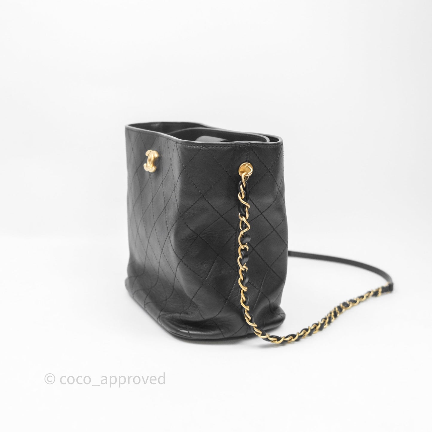Chanel Quilted Drawstring Bucket Bag Black Calfskin Aged Gold Hardware