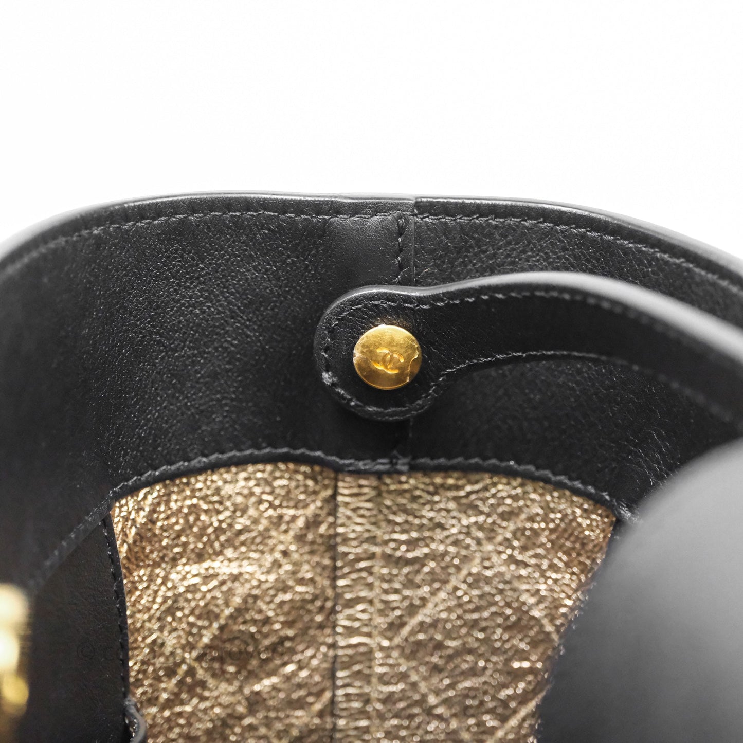 Chanel Quilted Drawstring Bucket Bag Black Calfskin Aged Gold Hardware