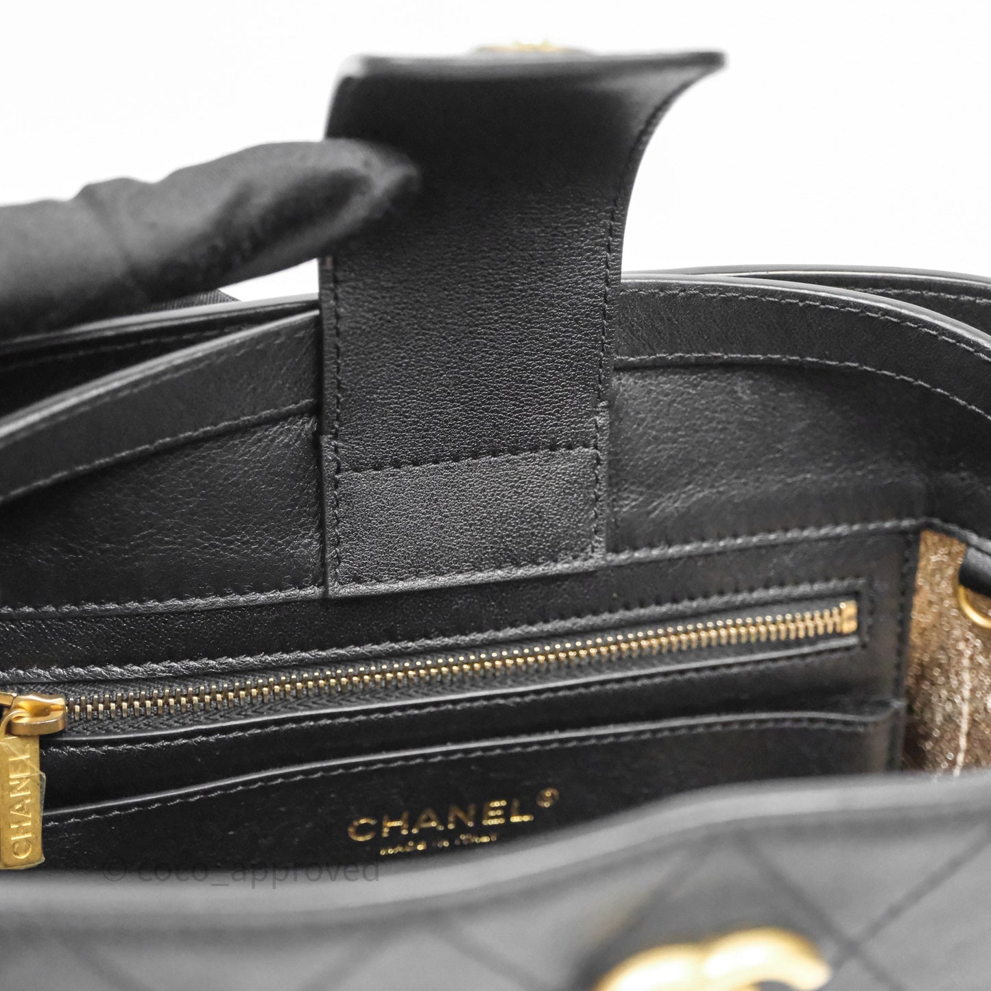Chanel Quilted Drawstring Bucket Bag Black Calfskin Aged Gold Hardware
