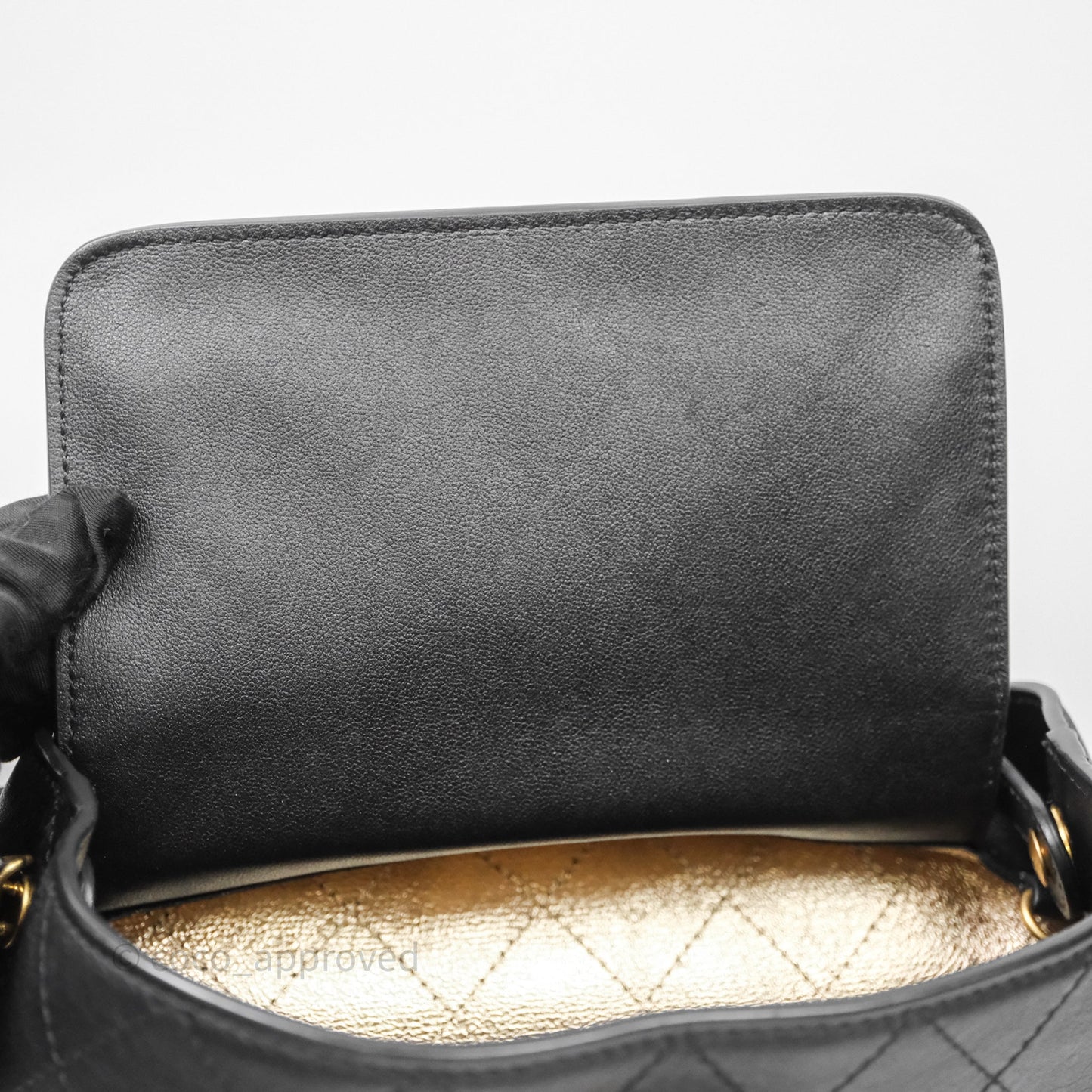 Chanel Quilted Drawstring Bucket Bag Black Calfskin Aged Gold Hardware